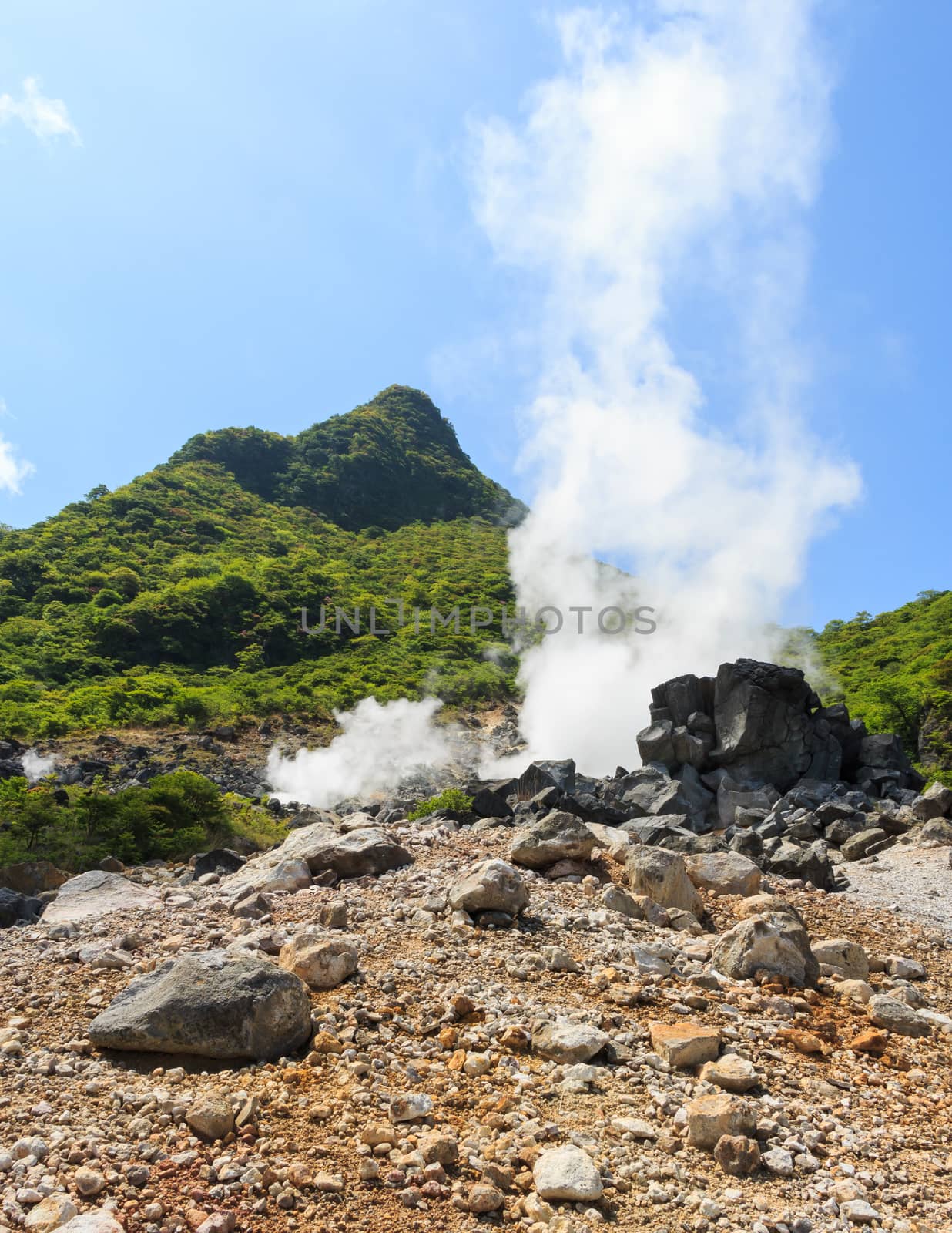 Owakudani valley ( volcanic valley with active sulphur and hot s by stockdevil