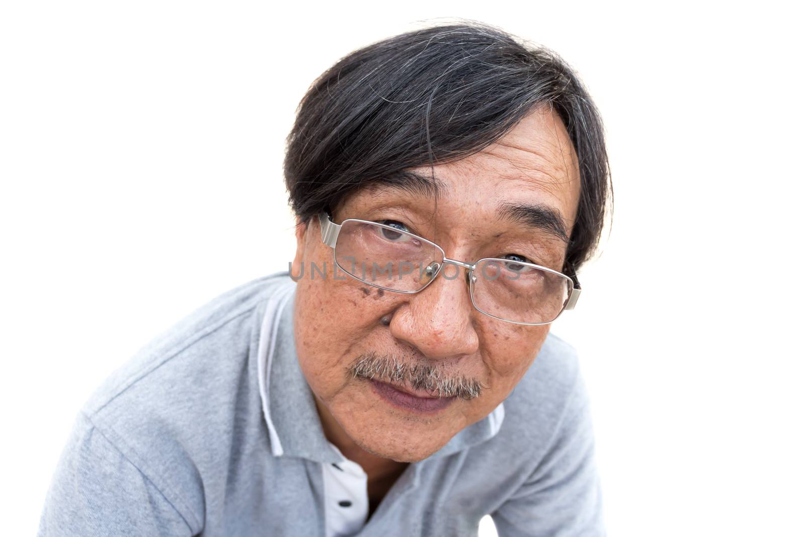 old age and grizzly man (acne,mustache,mole,wrinkle on face) with eye glasses is looking to something on white background (isolated)