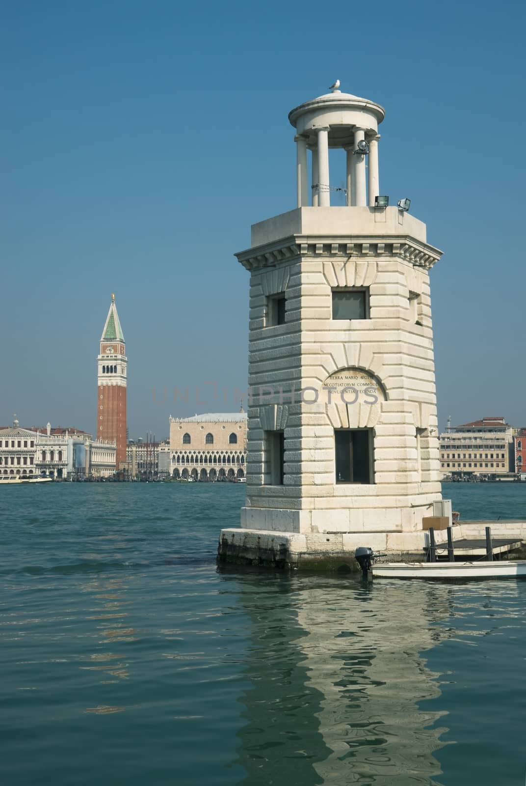 Venetian lighthouse near the island of San Giorgio in Venice on a clear spring day