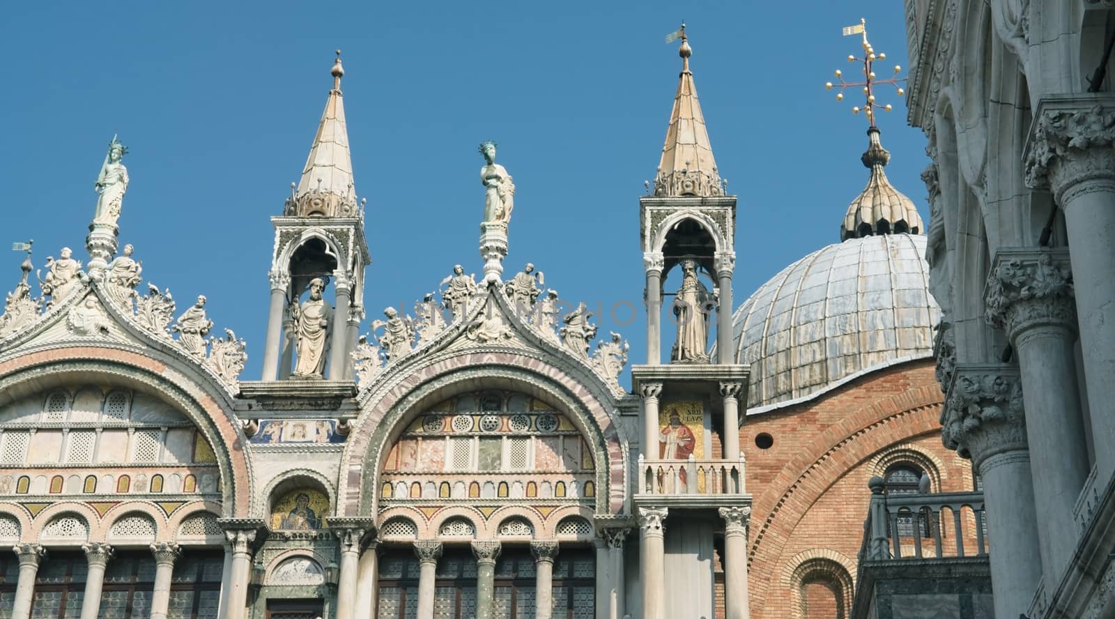 Sculptures and decoration of the Cathedral of San Marco in Venice on a sunny spring day