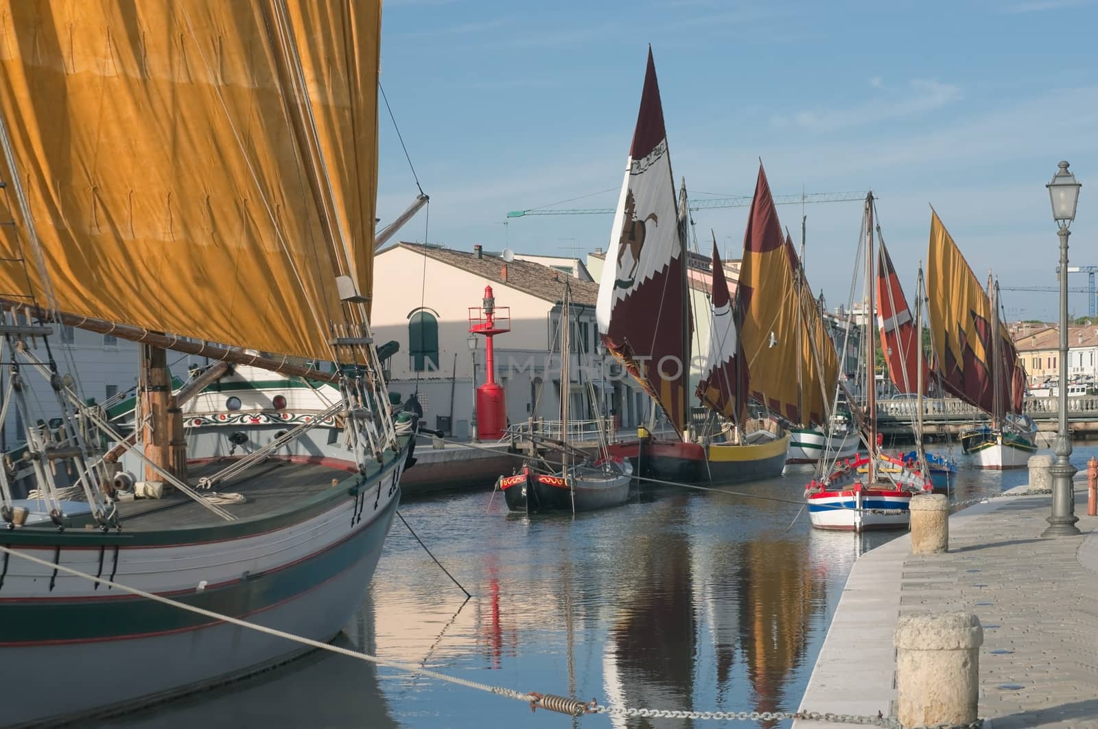 Old fishing ships at the pier in Cesenatico, Italy