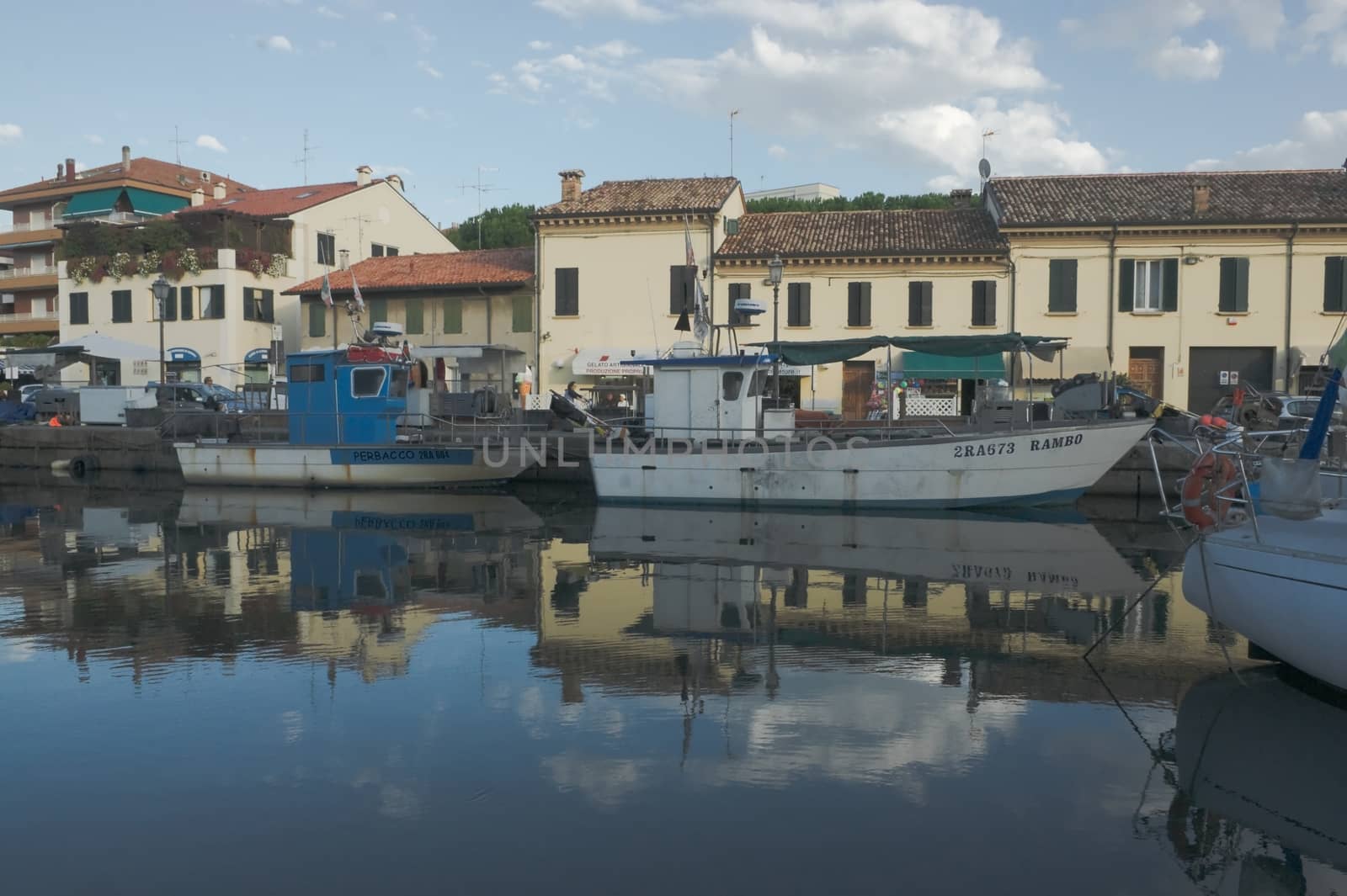 Fishing boats at the dock in the fishing port in Cervia on the Adriatic coast of Italy