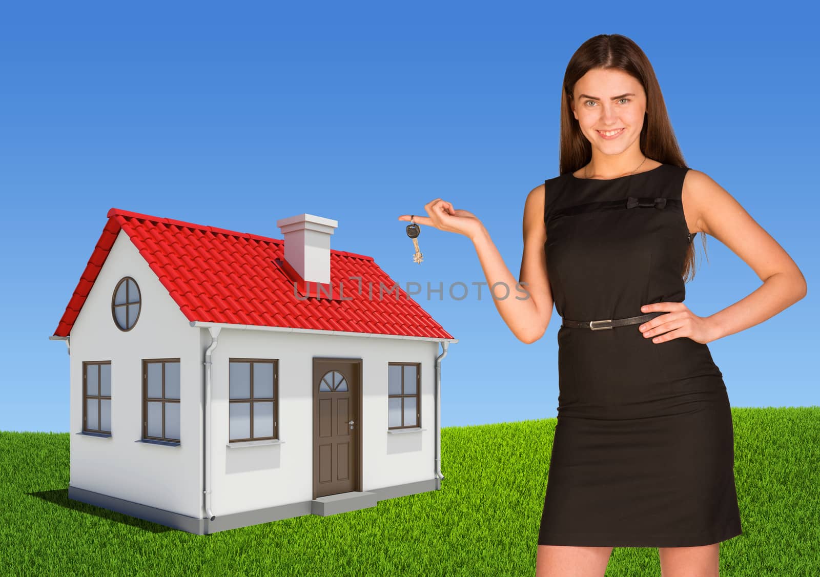 Businesswoman pointing at house, showing key. Green lawn and sky as backdrop