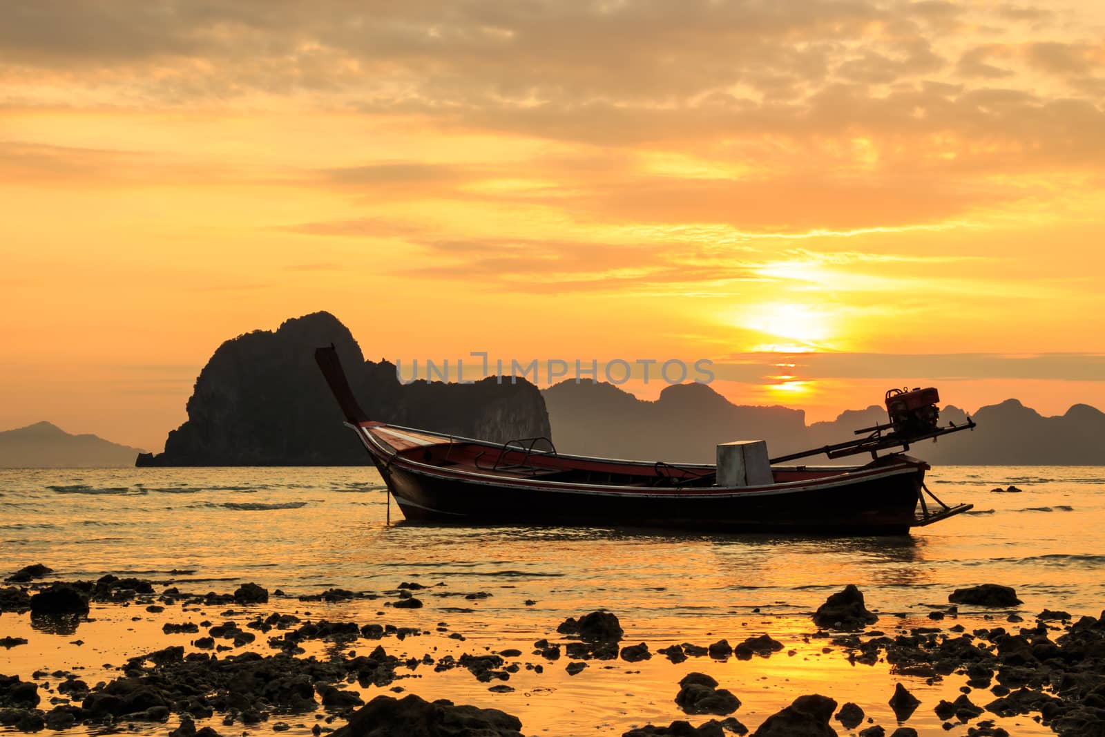 boat on beach and sunrise in summer at Trang ,Thailand