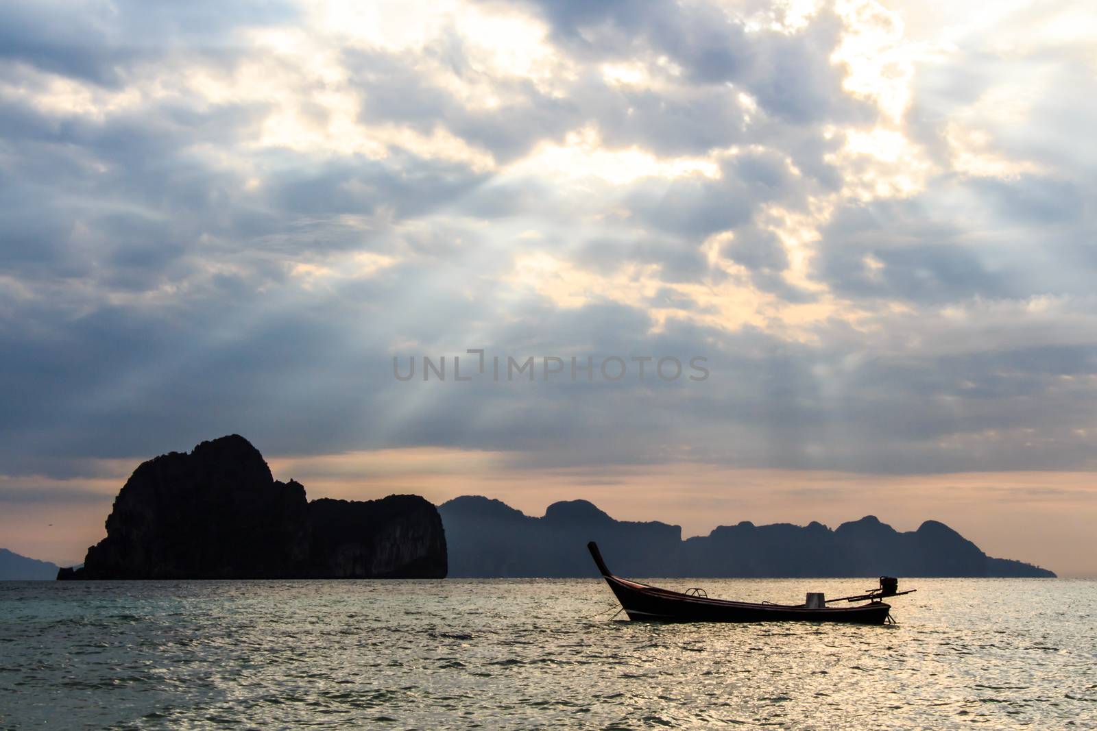 boat on sea and sky with sunbeam at Trang ,Thailand