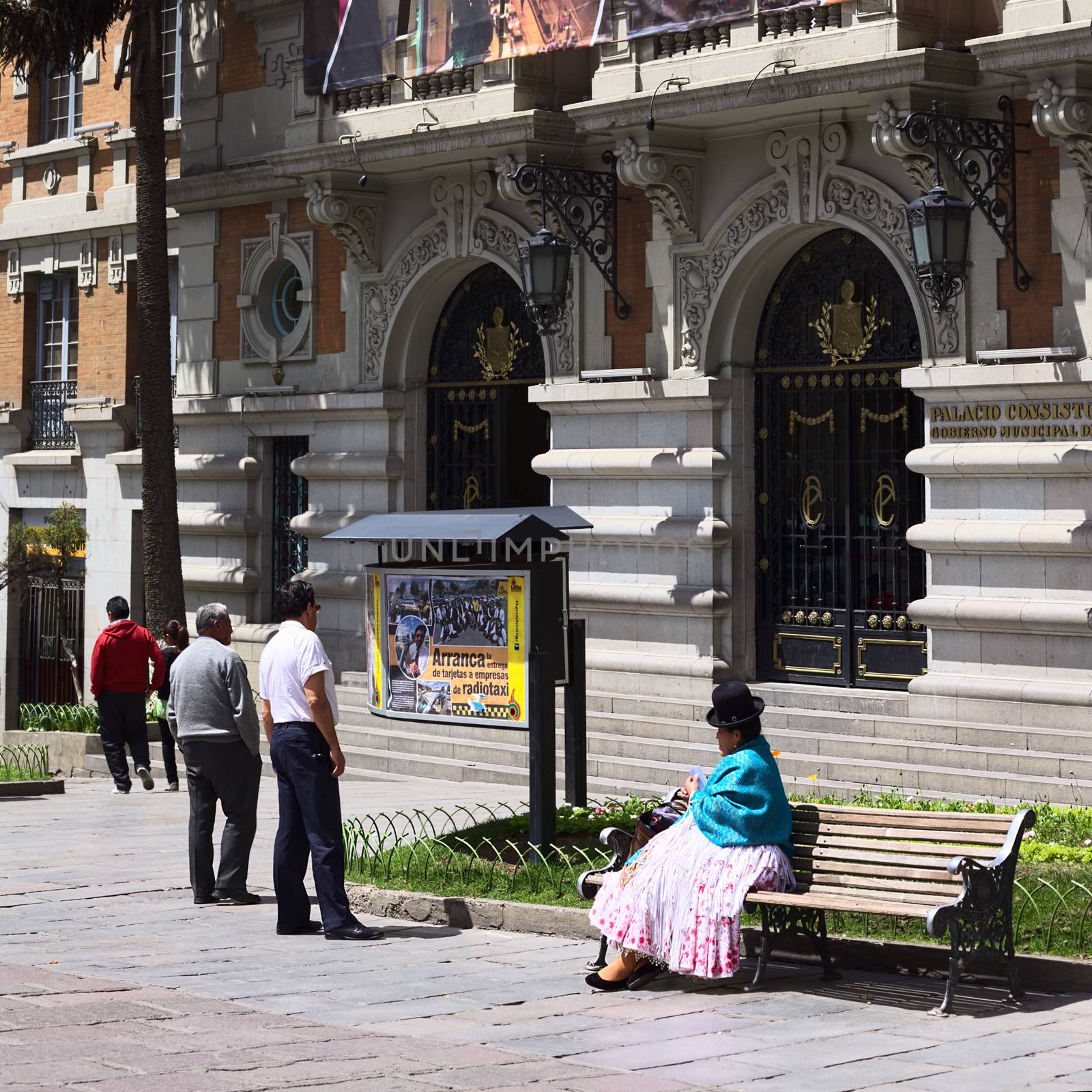 LA PAZ, BOLIVIA - OCTOBER 11, 2014: Unidentified people in front of the entrance of the Palacio Consistorial Gobierno Municipal de La Paz (city hall) on Mercado street in the city center on October 11, 2014 in La Paz, Bolivia