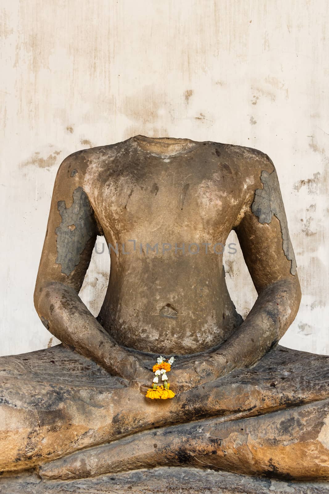 image of headless buddha due to damaged