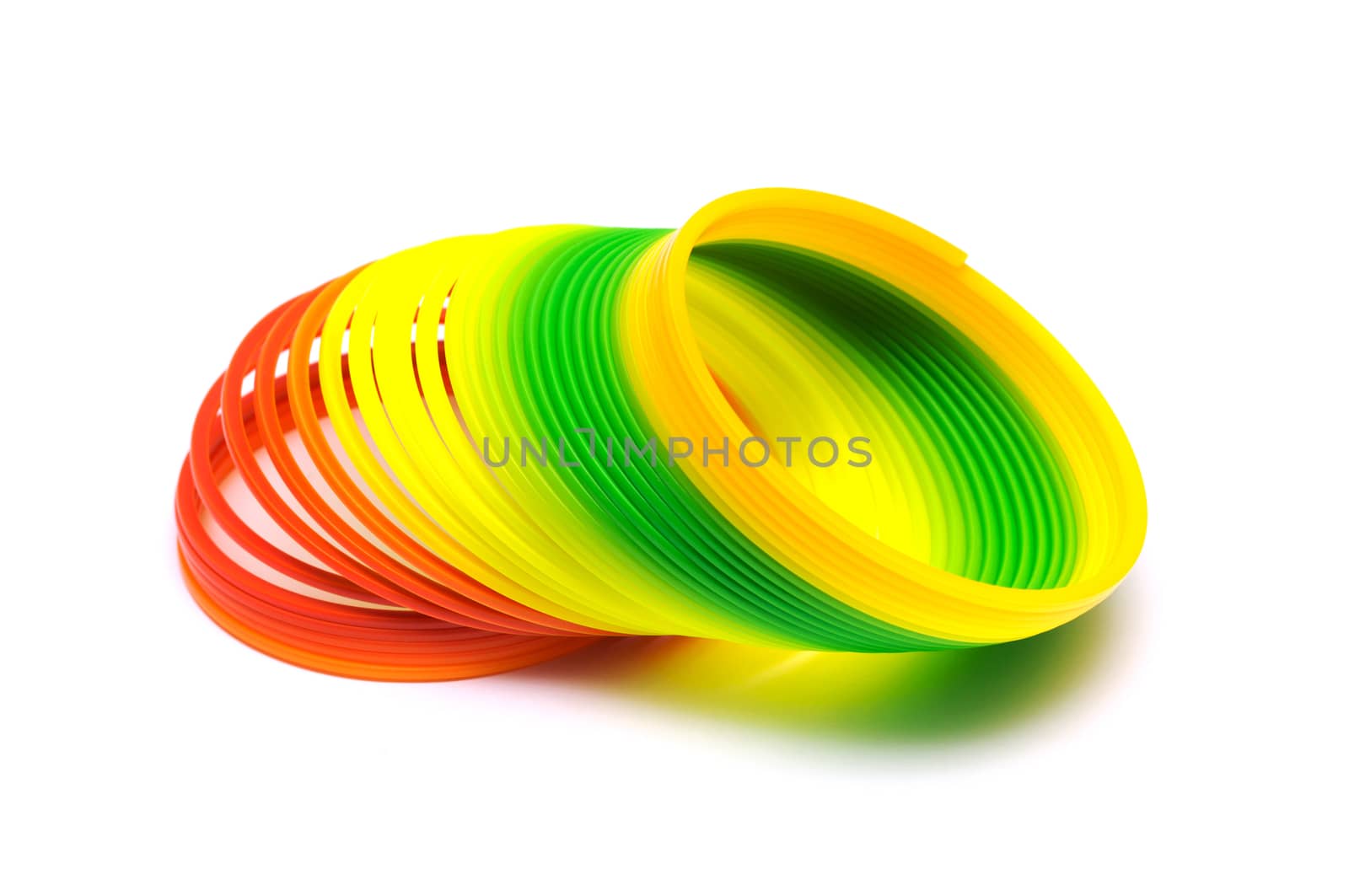 Colorful toy springs isolated on white