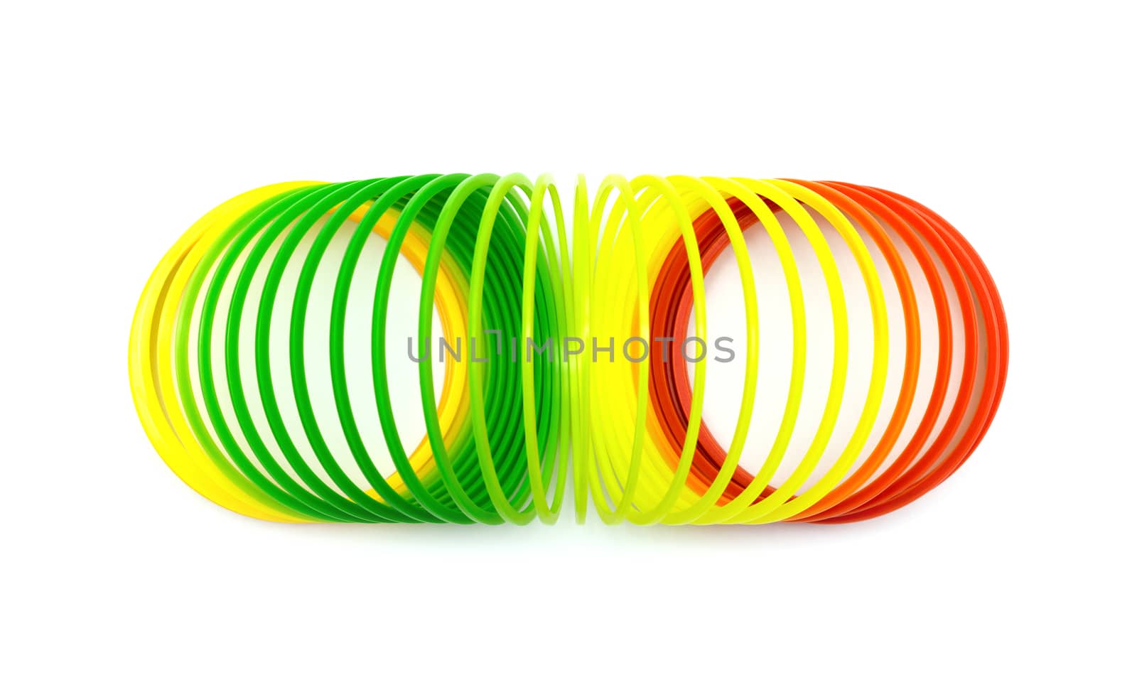 Colorful toy springs isolated on white by DNKSTUDIO