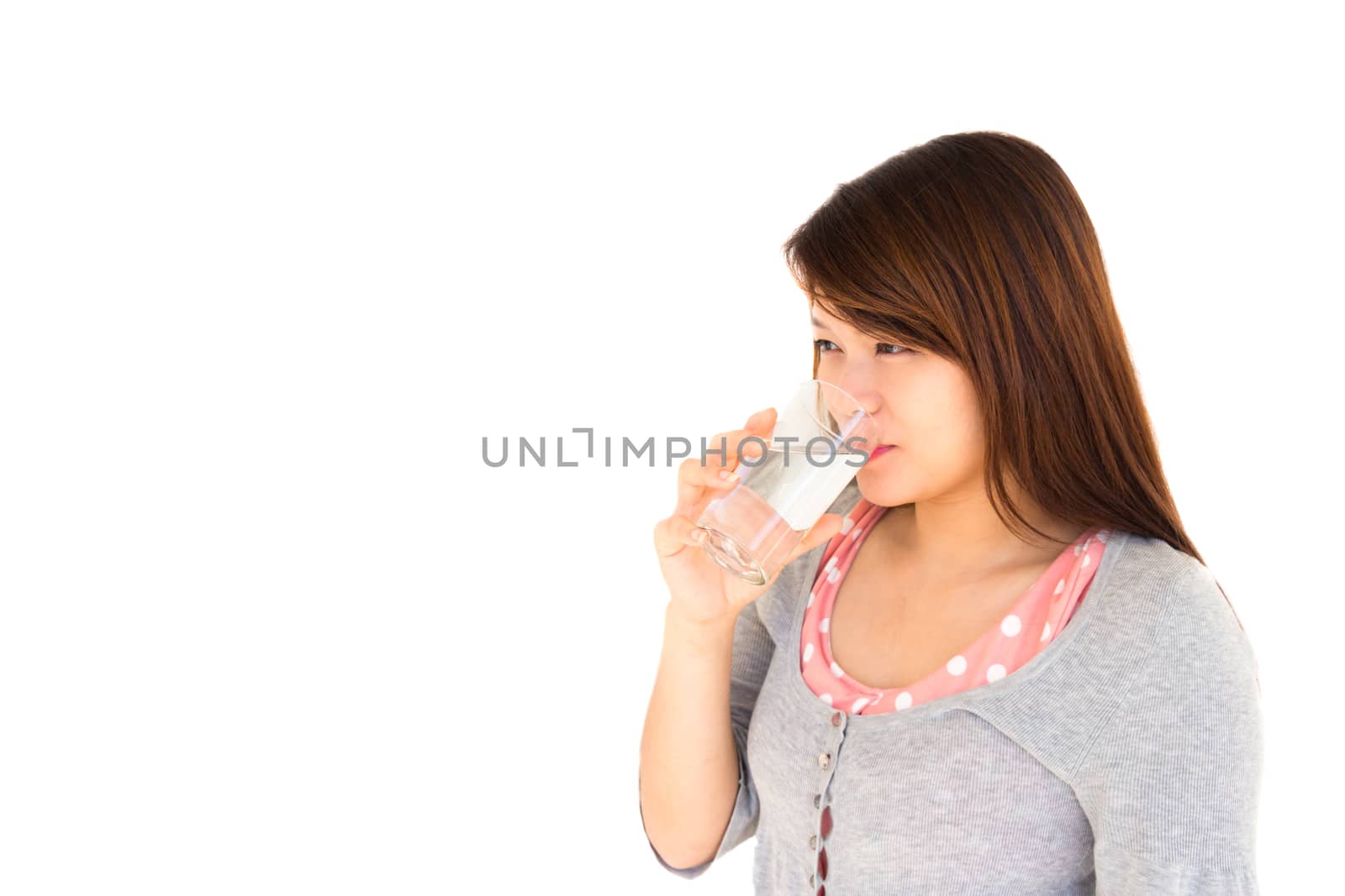 healthy asian woman is drinking water on white background
