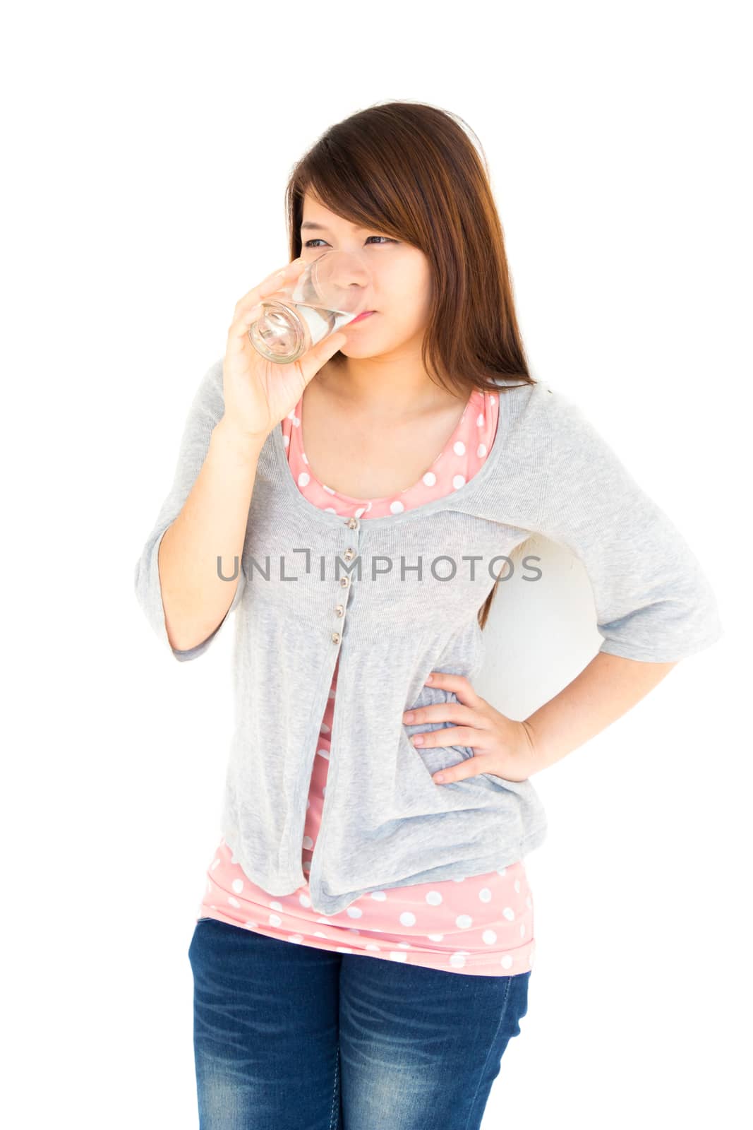 healthy asian woman is drinking water on white background