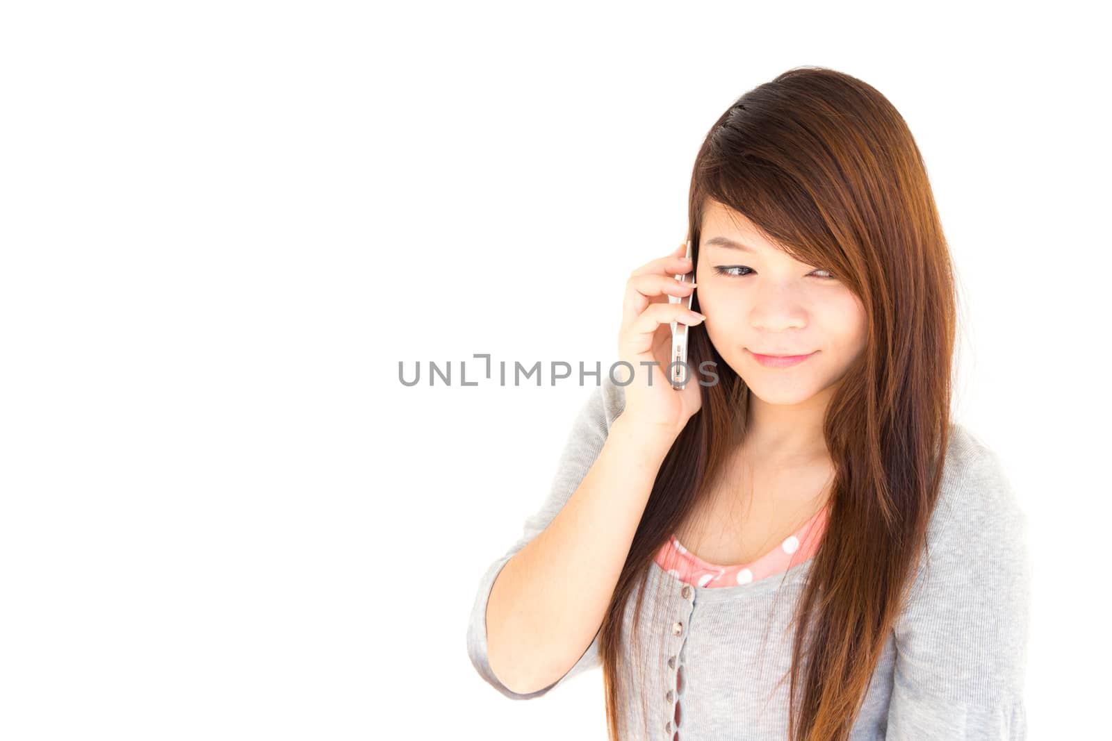 Asian woman is calling to someone on white background and blank area at left side