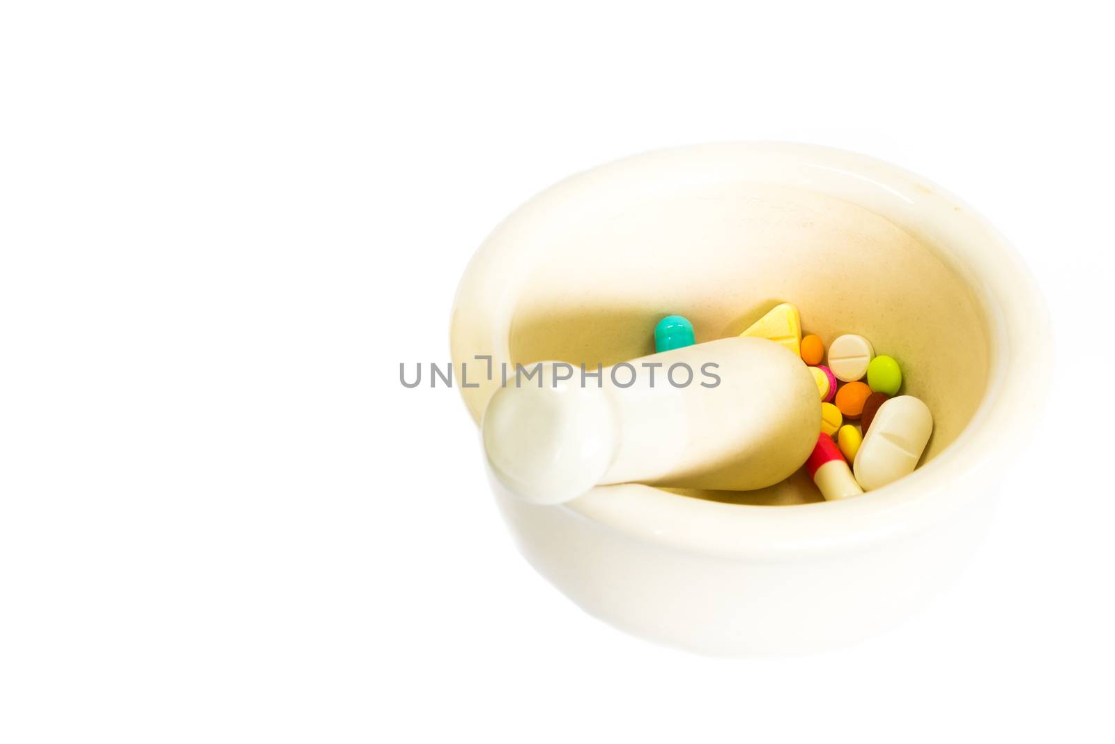 white cup for crush drugs on white background (isolated) and blank area at left side