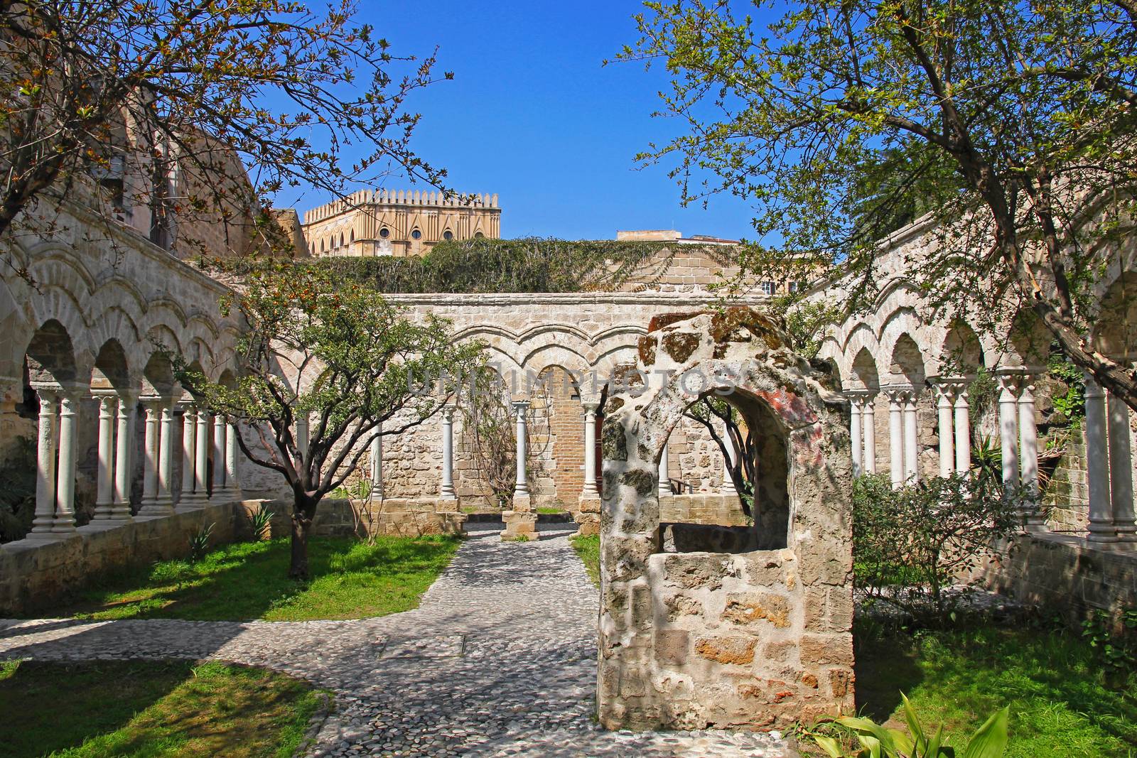 Italy. Sicily island. Palermo city. The monastery courtyard (cloister) of San Giovanni degli Eremiti Church in spring