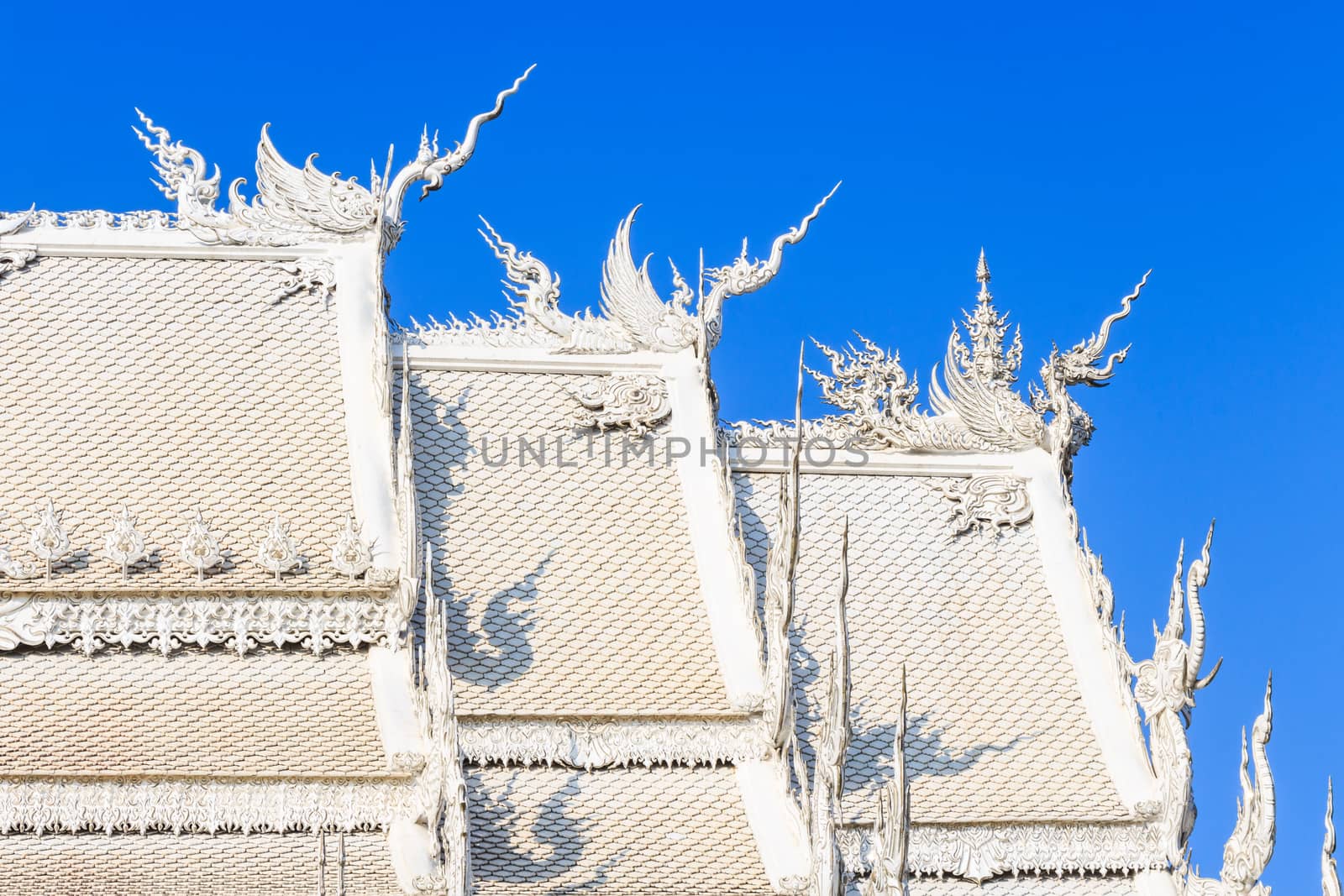 Swan statues on roof at Wat Rong Khun ,Chiangrai ,Thailand