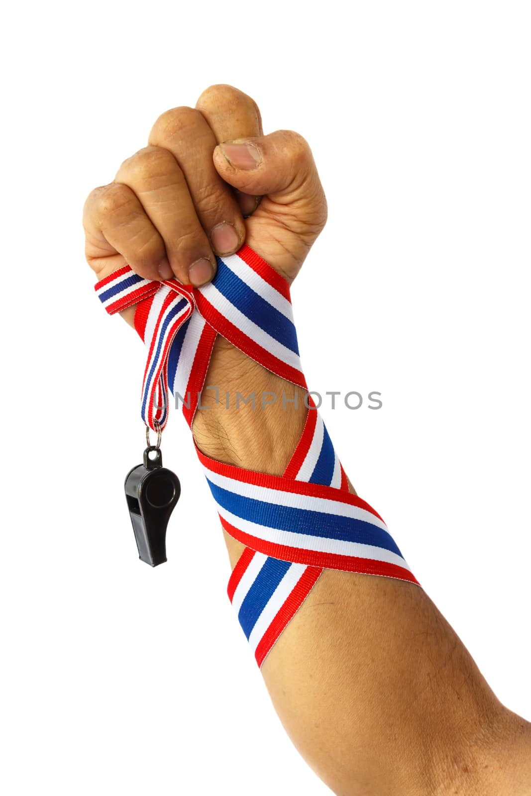 forearm of thai man with ribbon and whistle