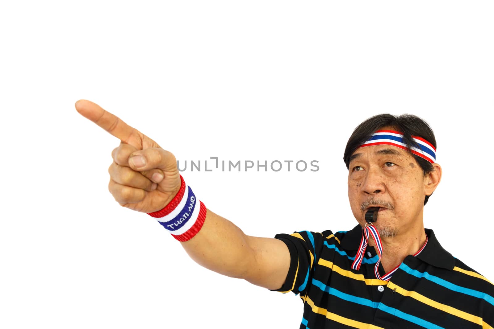 asian person is pointing a finger and blowing a whistle on white background (isolated) and blank area at upper side
