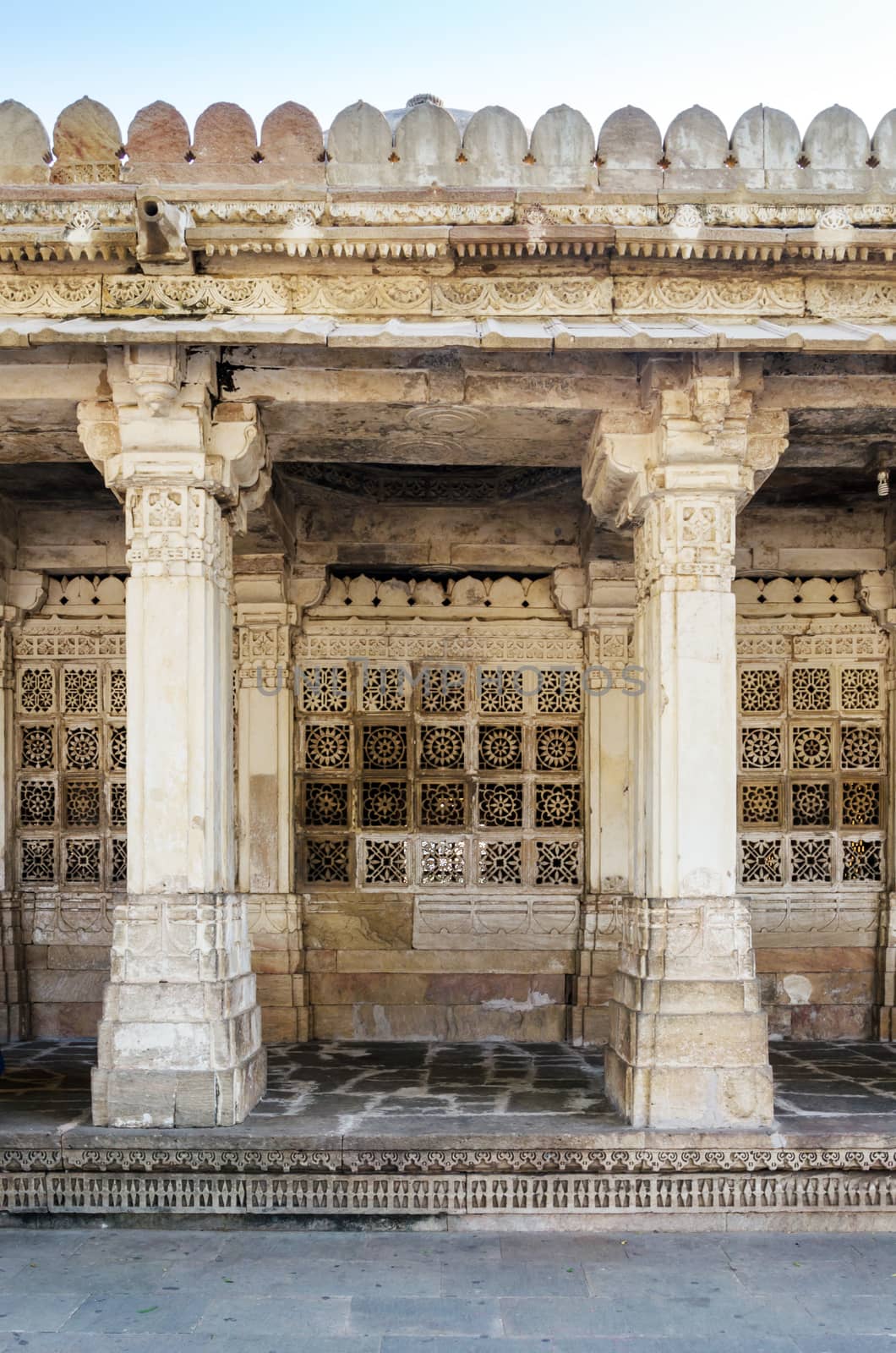 Carved stone grilles on the walls of the Tomb of Sufi Saint Shaikh Ahmed Khattu at Sarkhej Roza in Ahmedabad, India