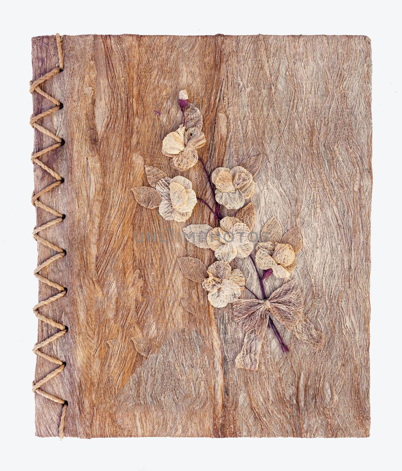 Old brown mulberry paper book isolated .
