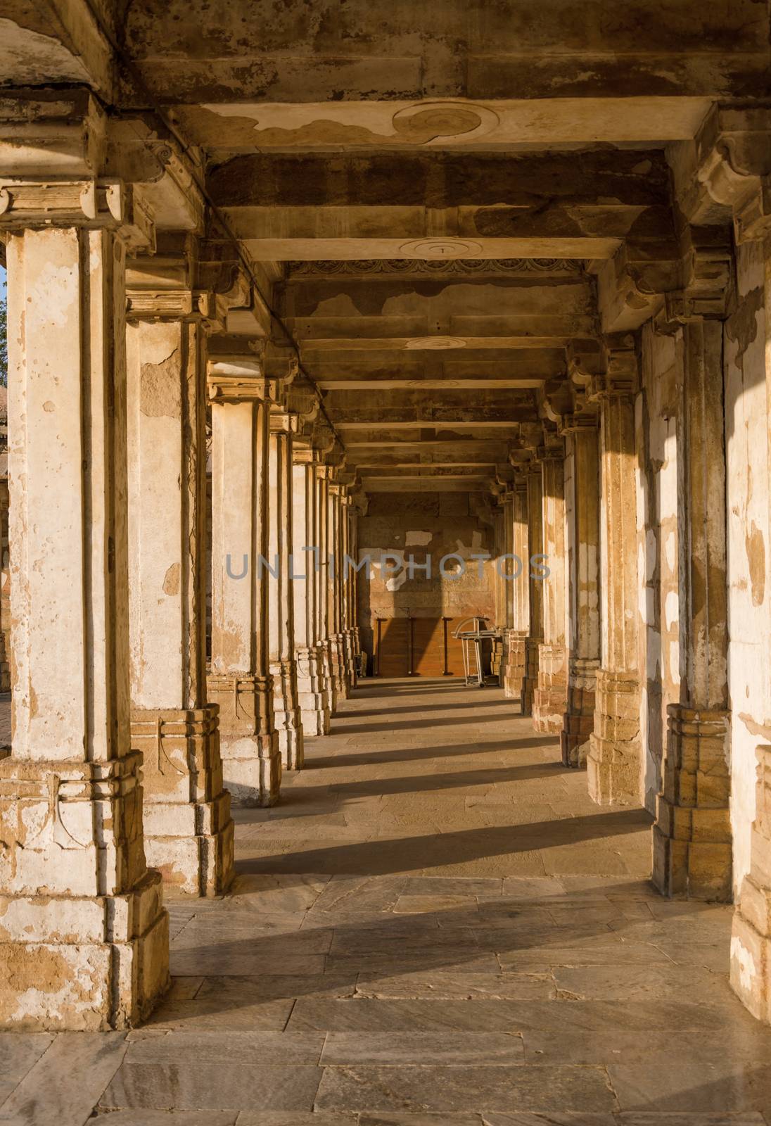Colonnaded cloister of historic Tomb at Sarkhej Roza mosque by siraanamwong
