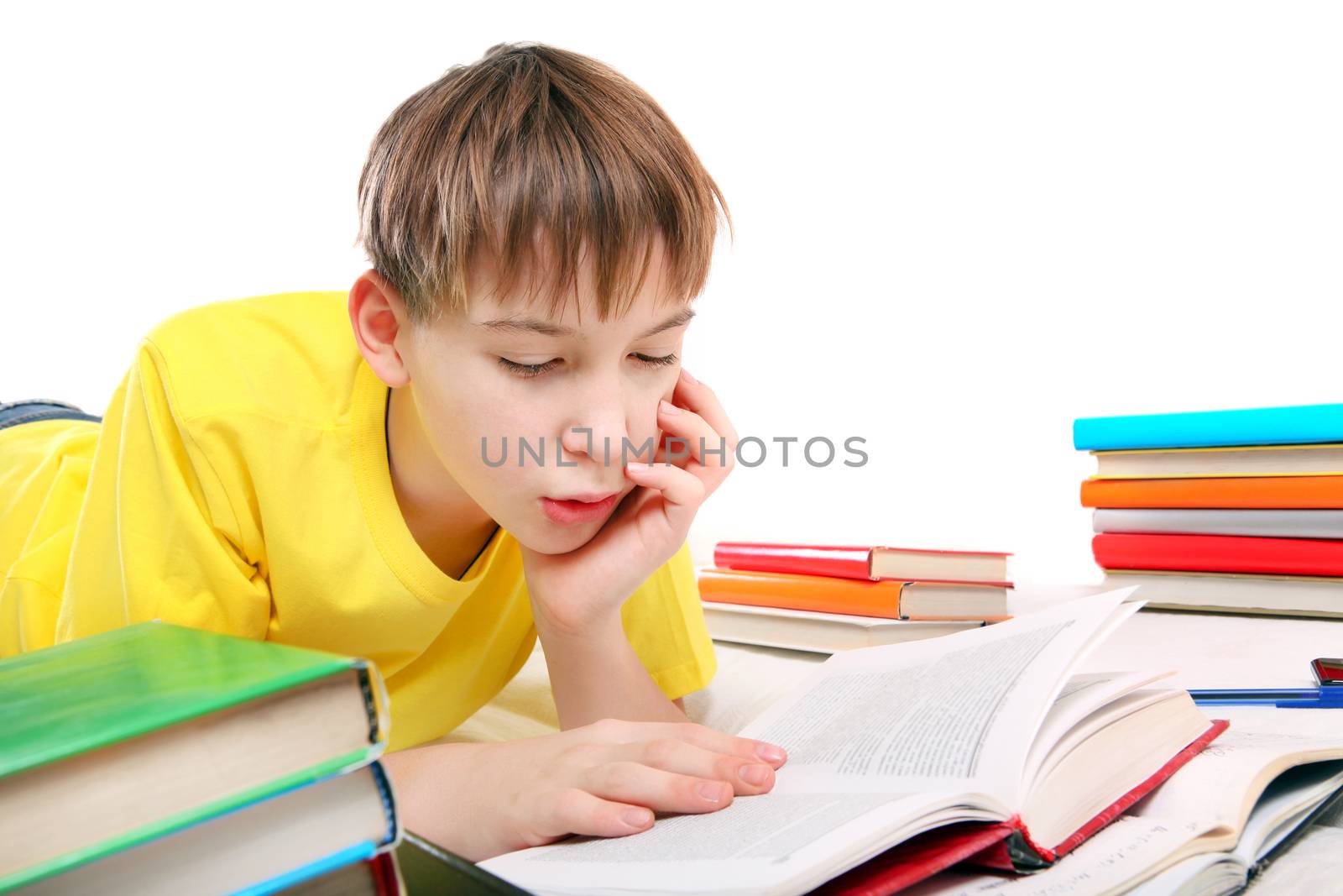 Kid read the Book at the Home on the White Background