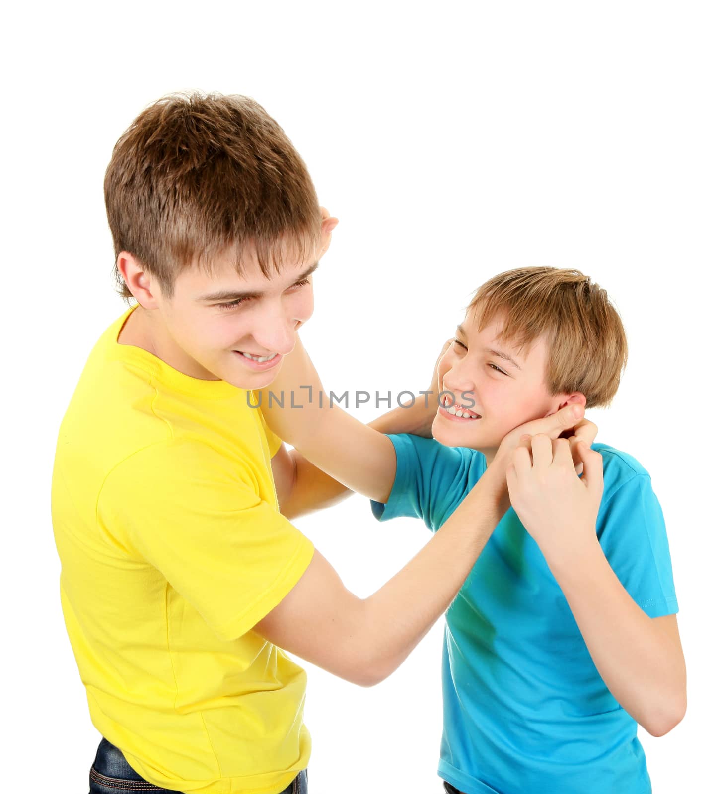 Playful Brothers fighting for Fun on the White background