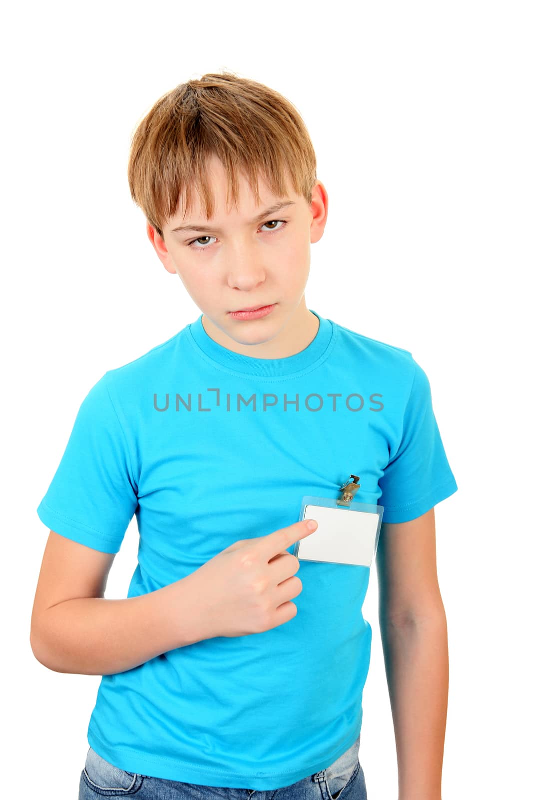 Sad Kid pointing on the Badge on t-shirt Isolated on the White Background