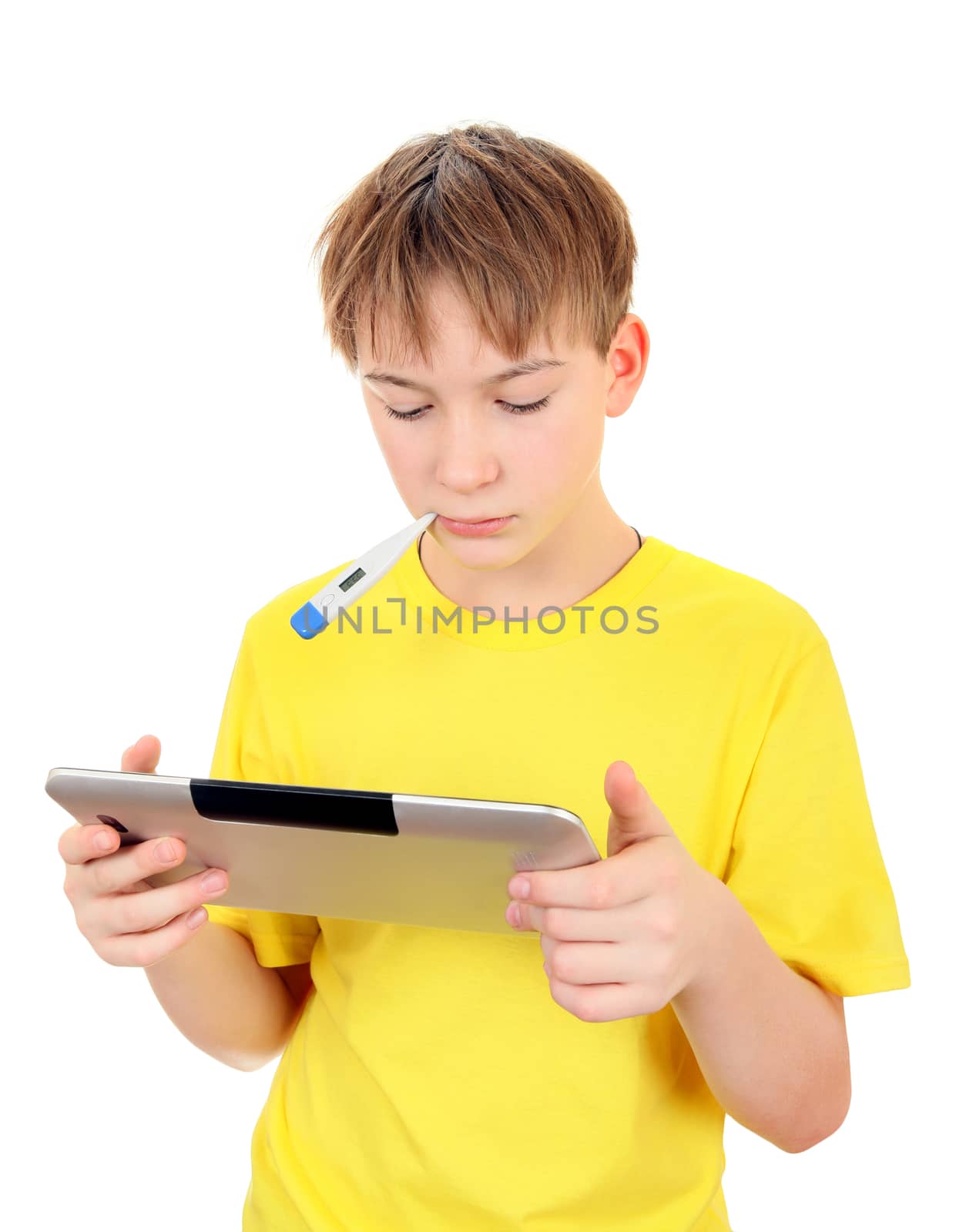 Sick Kid with Tablet by sabphoto