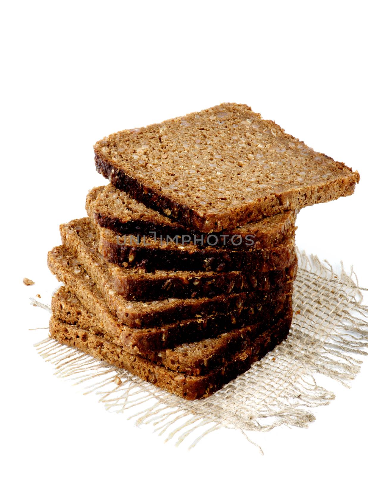 Sliced Multi Grain Brown Bread on Sackcloth isolated on white background