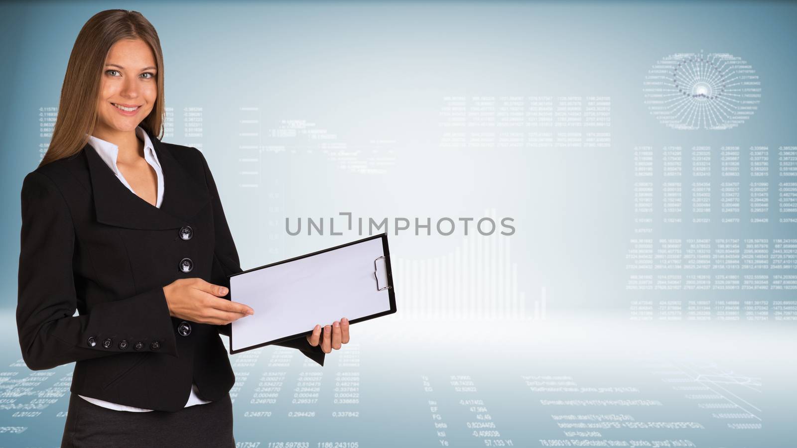 Businesswoman holding blank clipboard by cherezoff