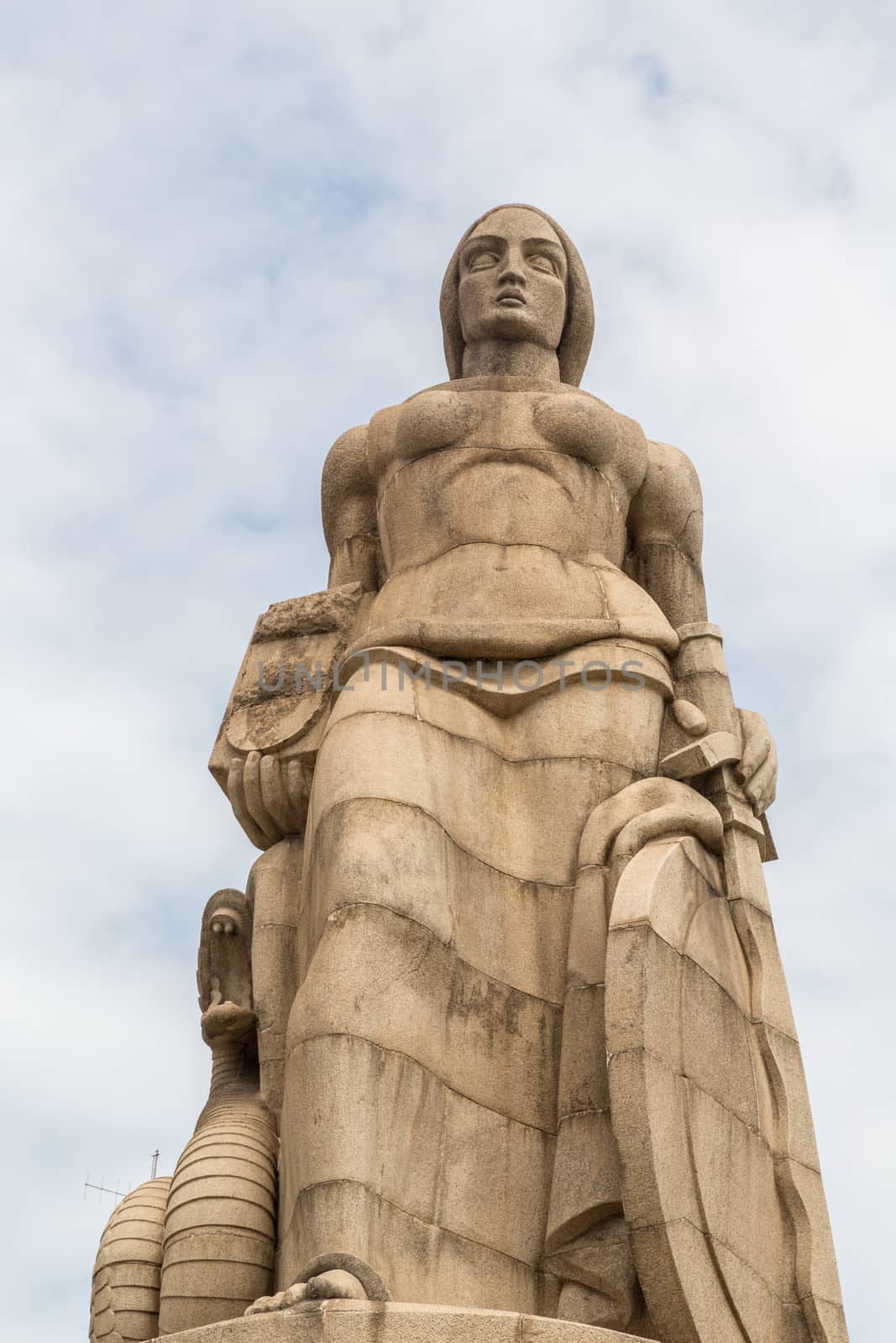 Statue of a woman with a sword and shield on one side and a serpent on the other, erected to commemorate those the Portuguese who died during the first world war ��� Maputo, Mozambique