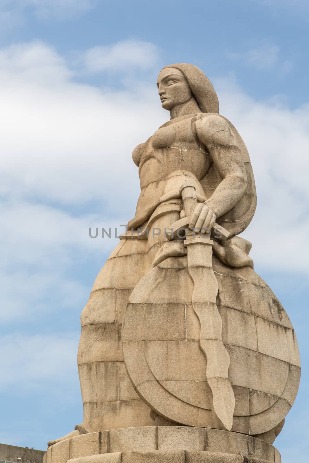 Statue of a woman with a sword and shield on one side and a serpent on the other, erected to commemorate those the Portuguese who died during the first world war Maputo, Mozambique