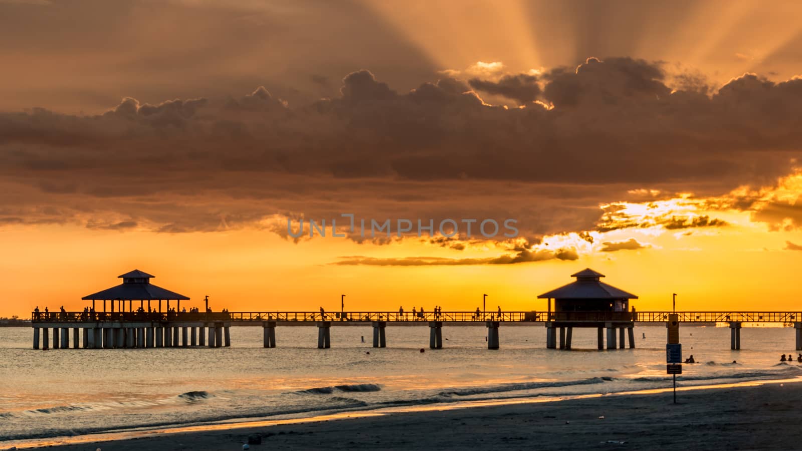 The beautiful sun setting on the shores of Fort Myers Beach located on Estero Island in Florida, United States of America