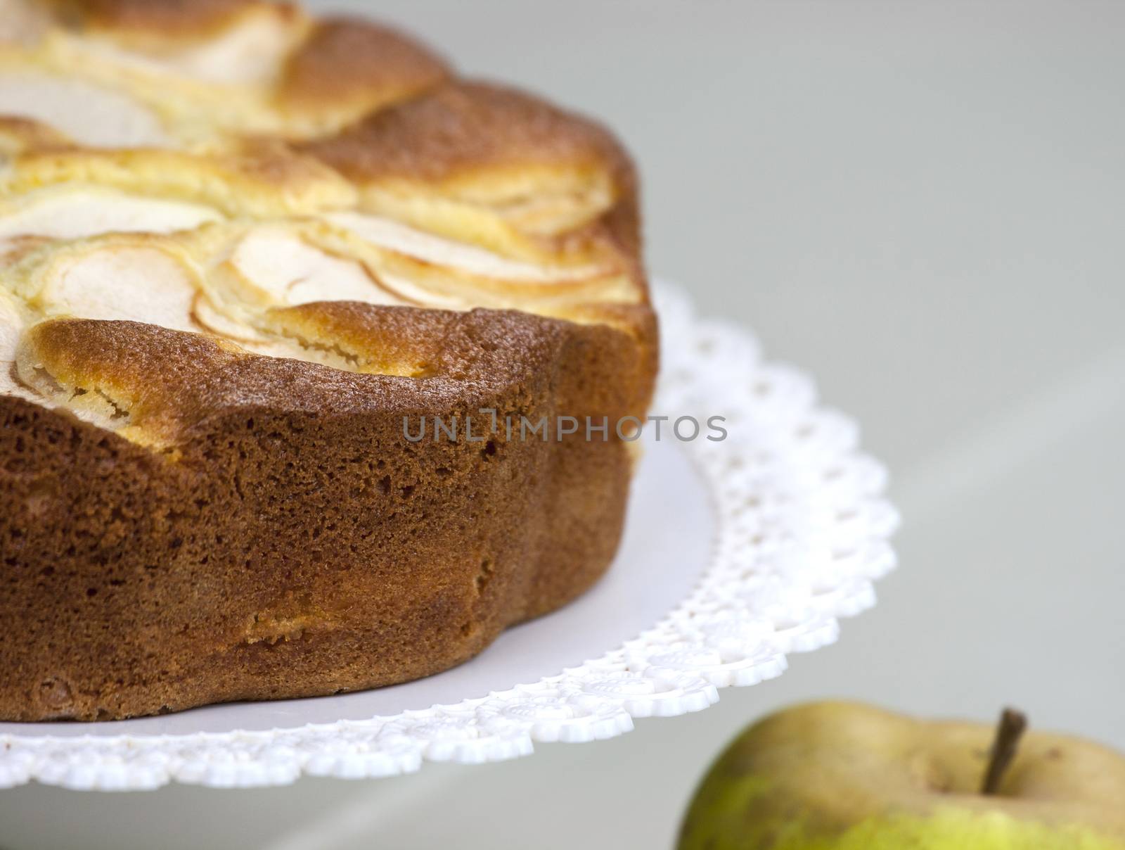 Homemade italian baked apple pie over a white table