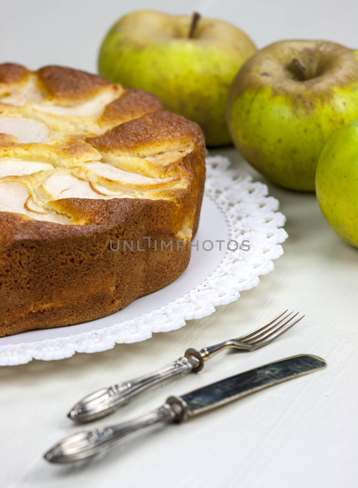 Homemade italian baked apple pie over a white table