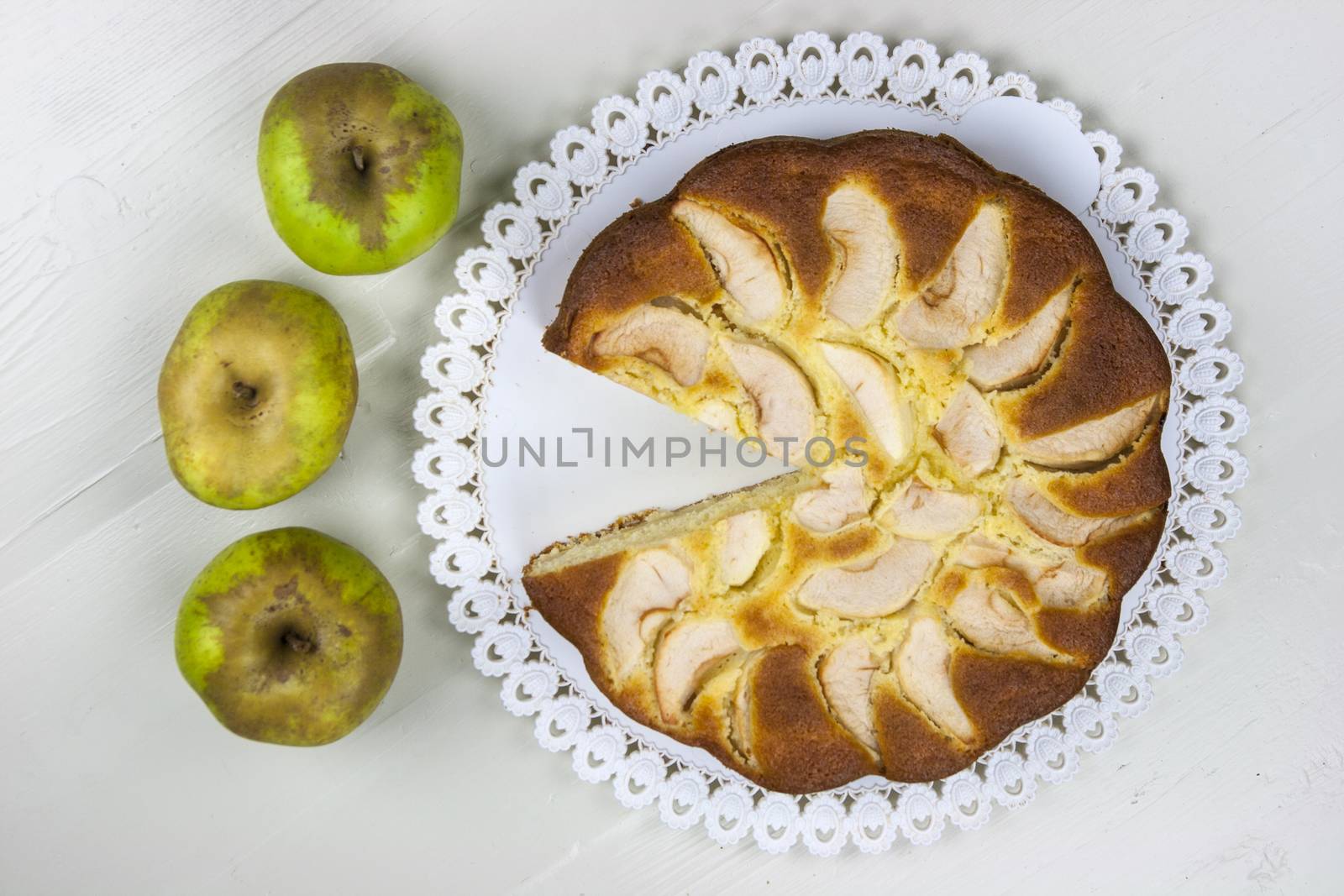 Homemade italian baked apple pie over a white table