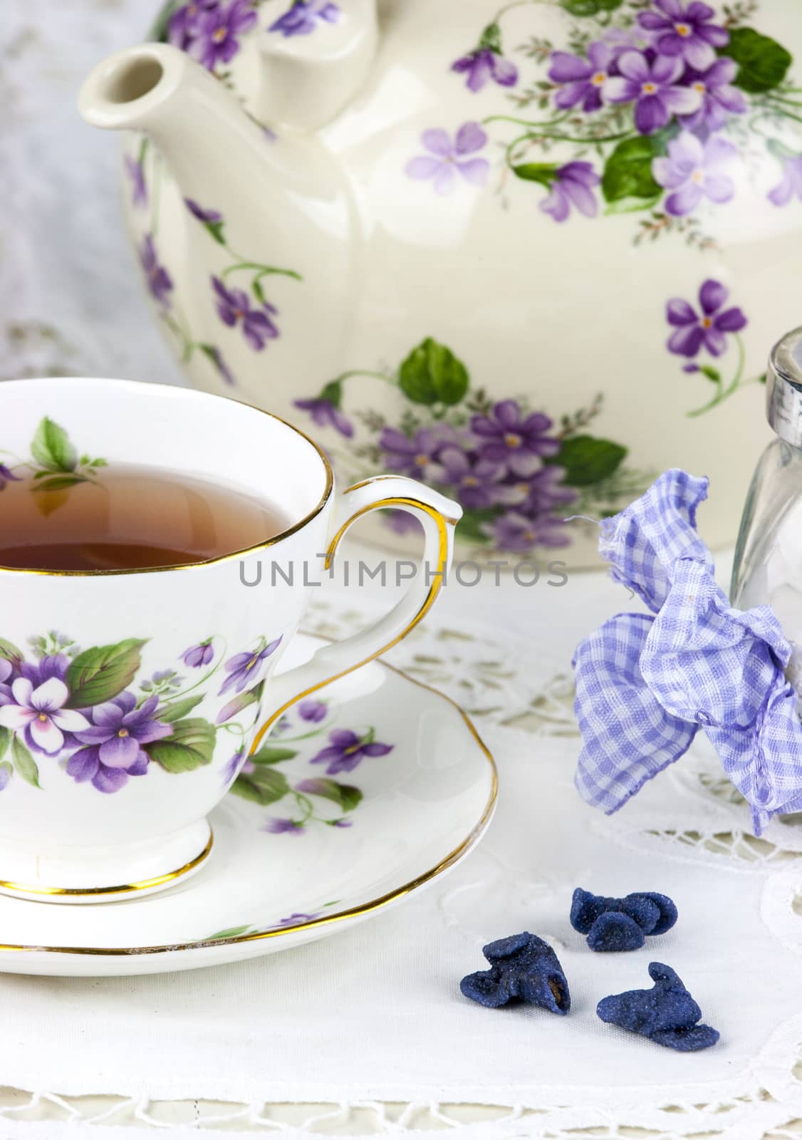 English afternoon tea with sweet and candied violets