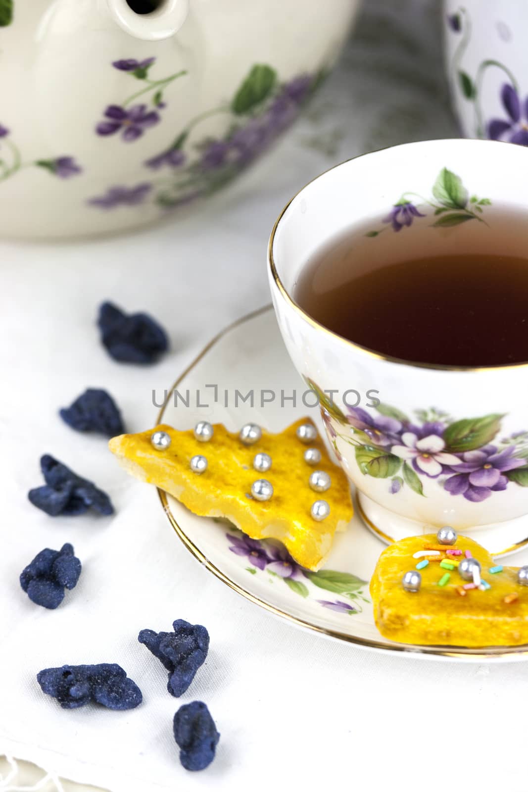 English afternoon tea with cookies and candied violets