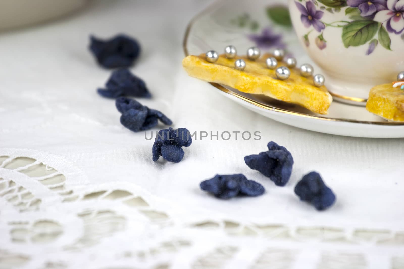 English afternoon tea with cookies and candied violets