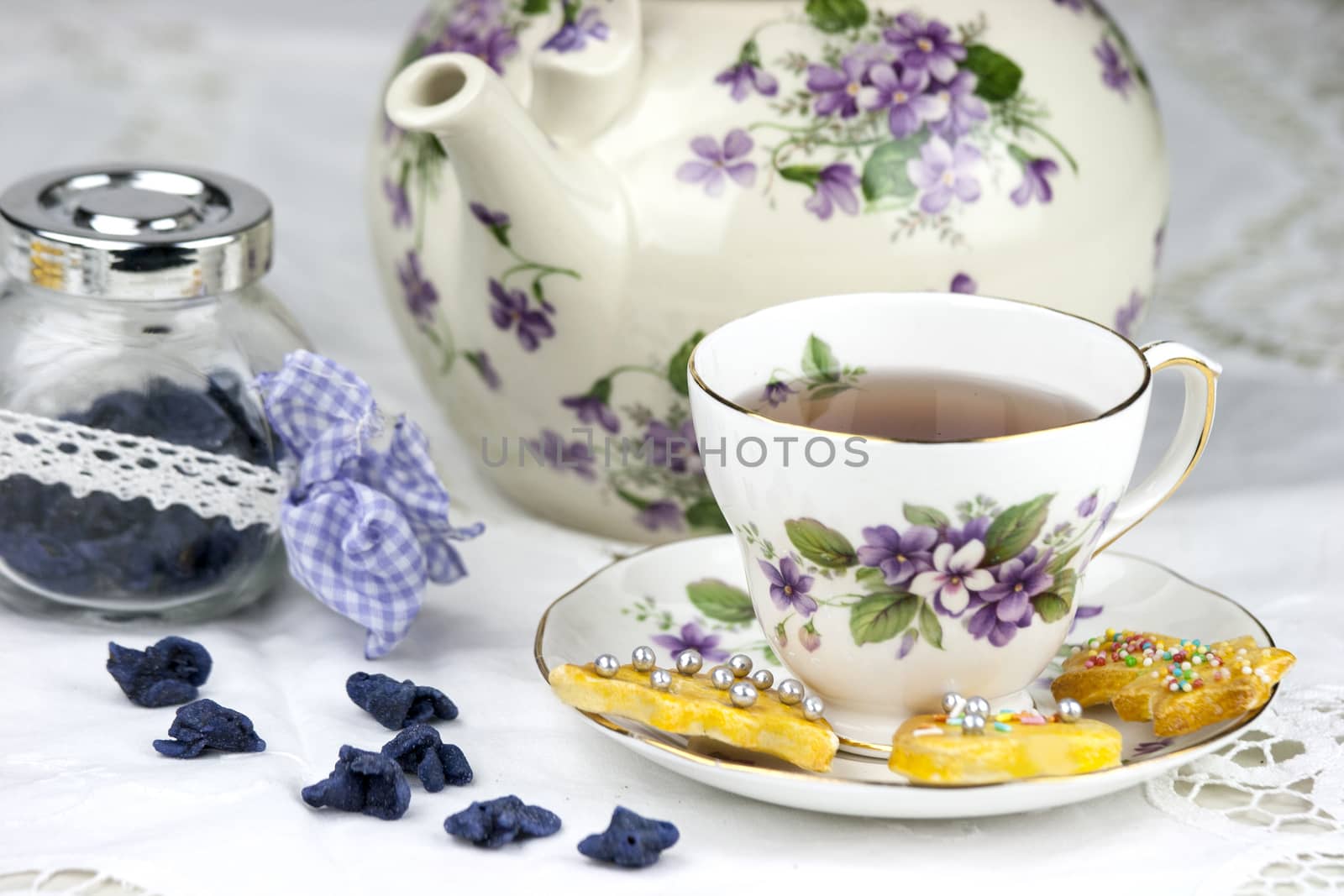 English afternoon tea with cookies and candied violets