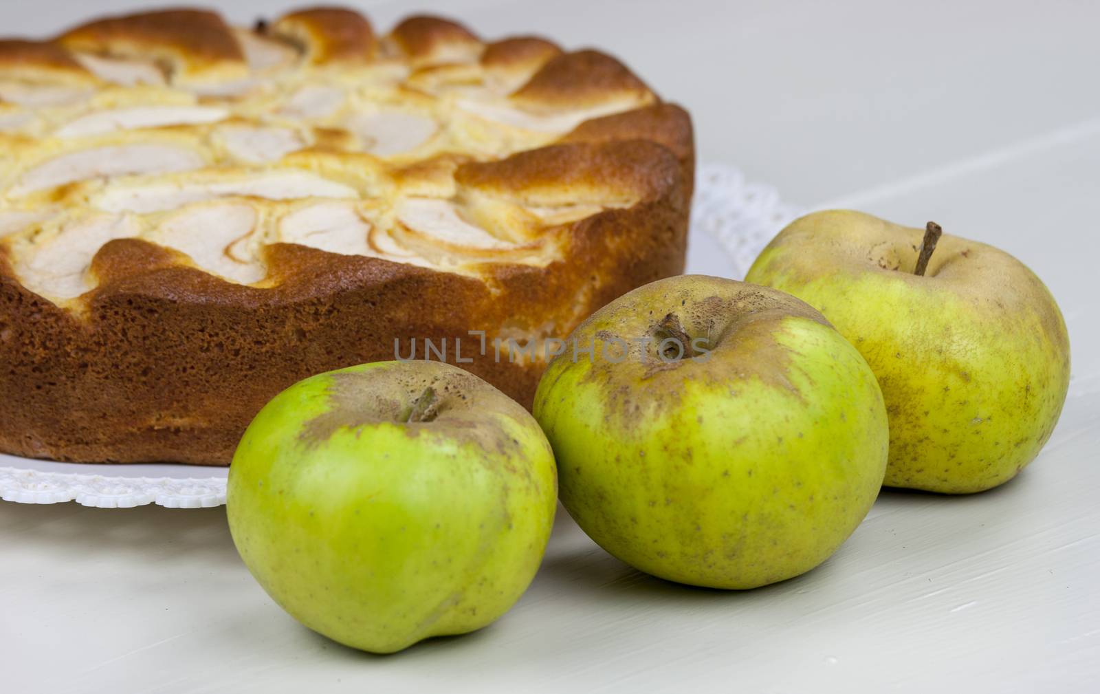 Homemade italian baked apple pie over a white table