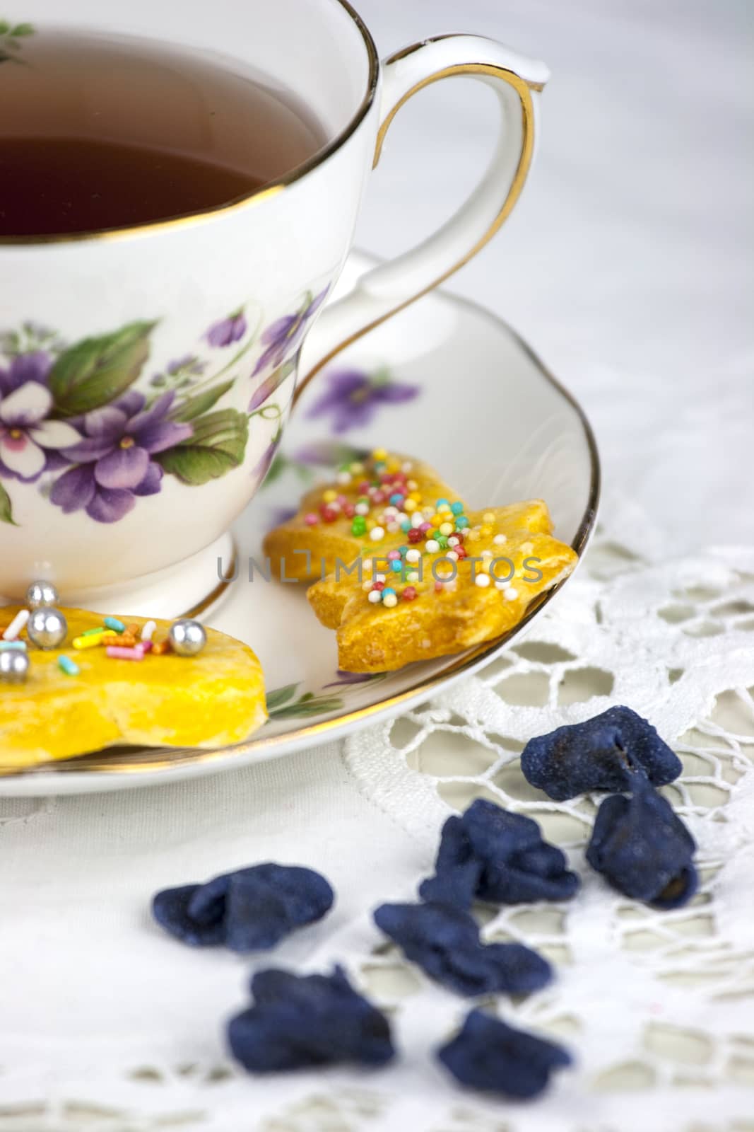 English afternoon tea with cookies and candied violets