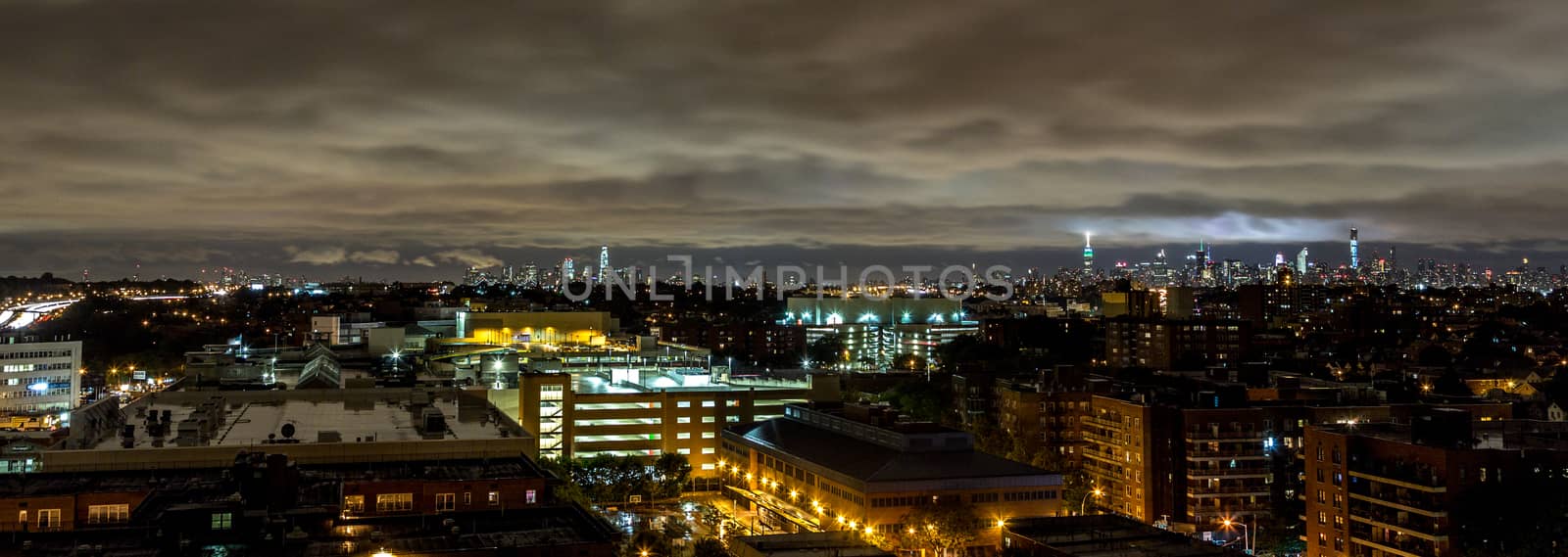 The view of Manhattan skyline at night from Queens, New York