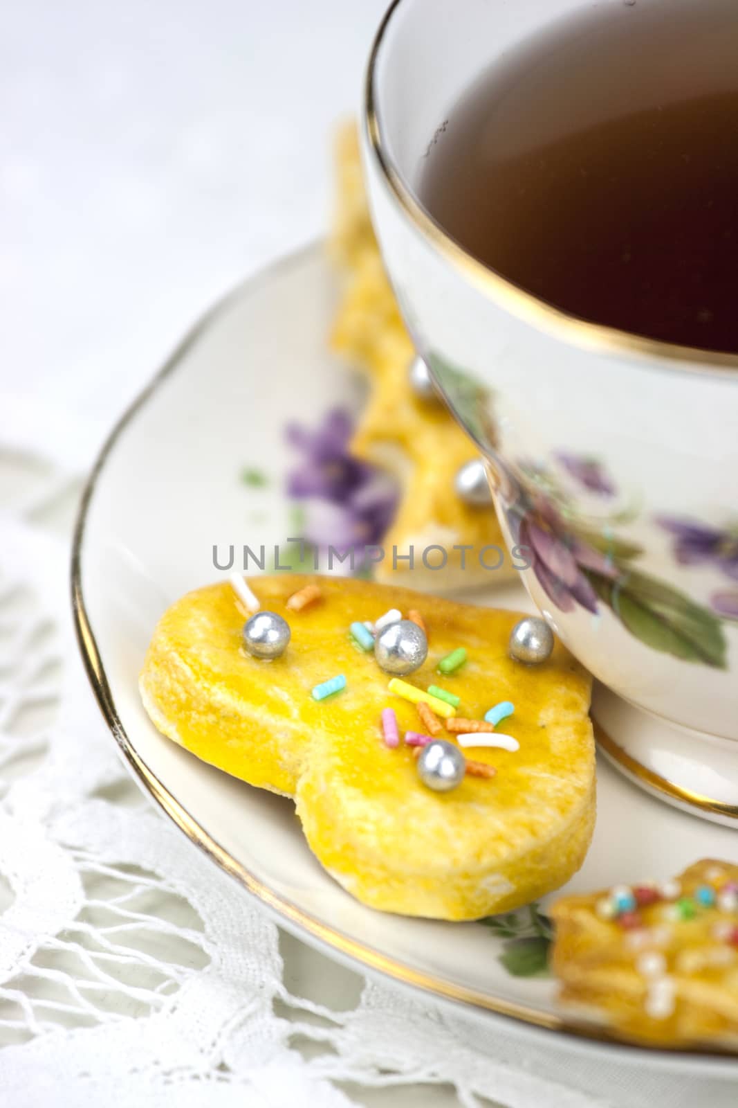 English afternoon tea with sweet and decored cookies