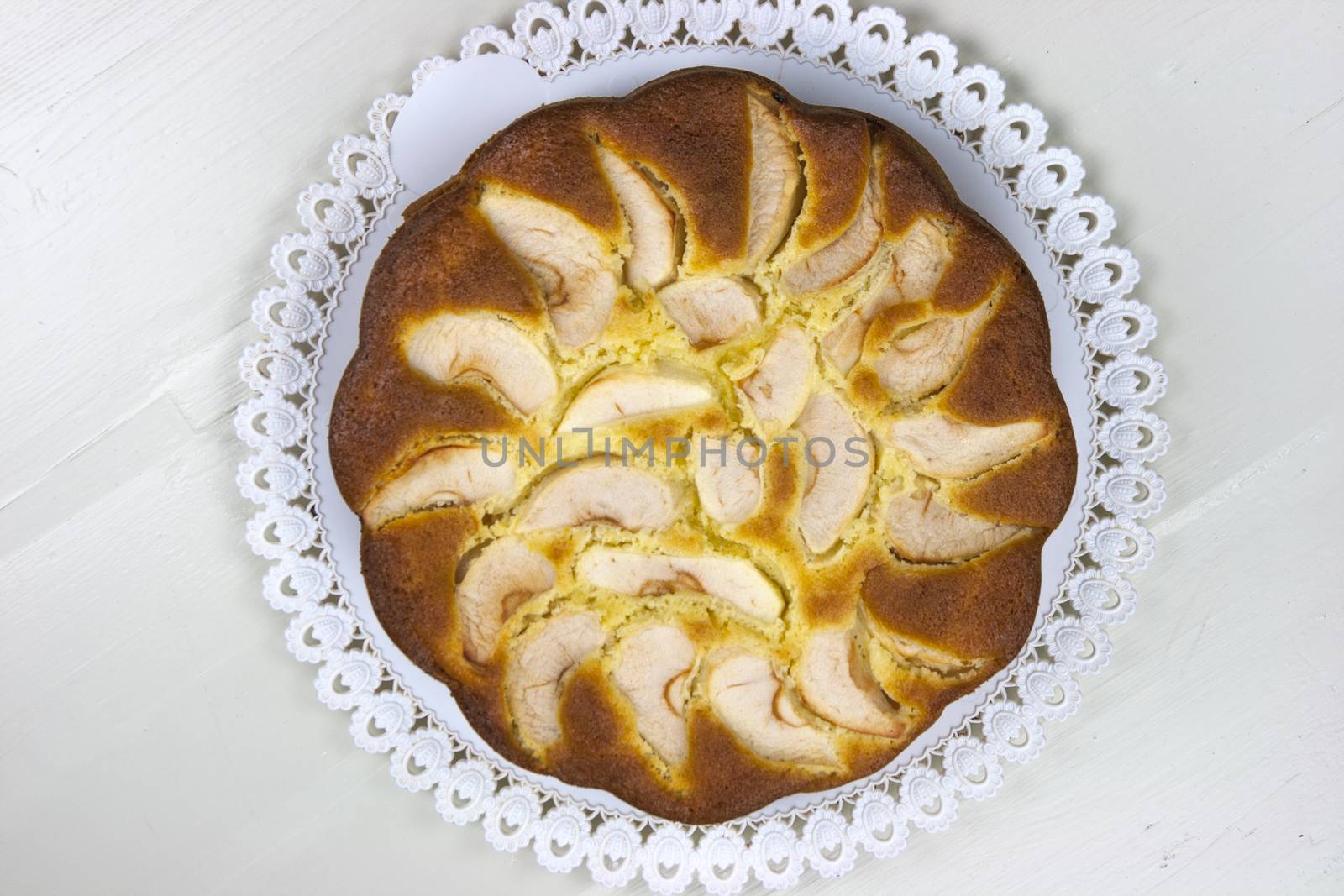 Homemade italian baked apple pie over a white table