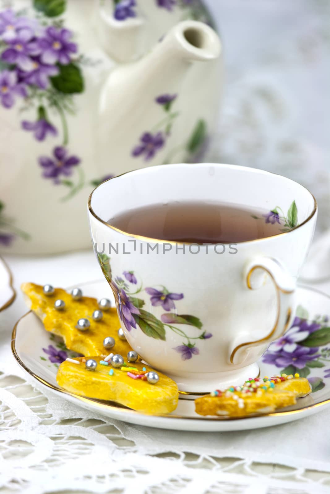 English afternoon tea with sweet and decored cookies