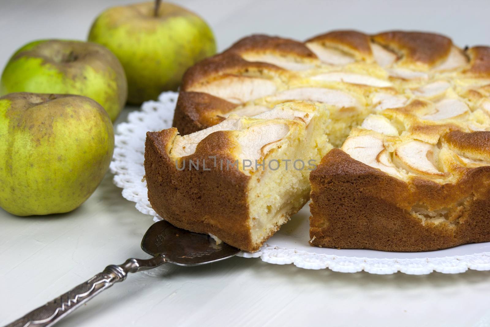 Homemade italian baked apple pie over a white table