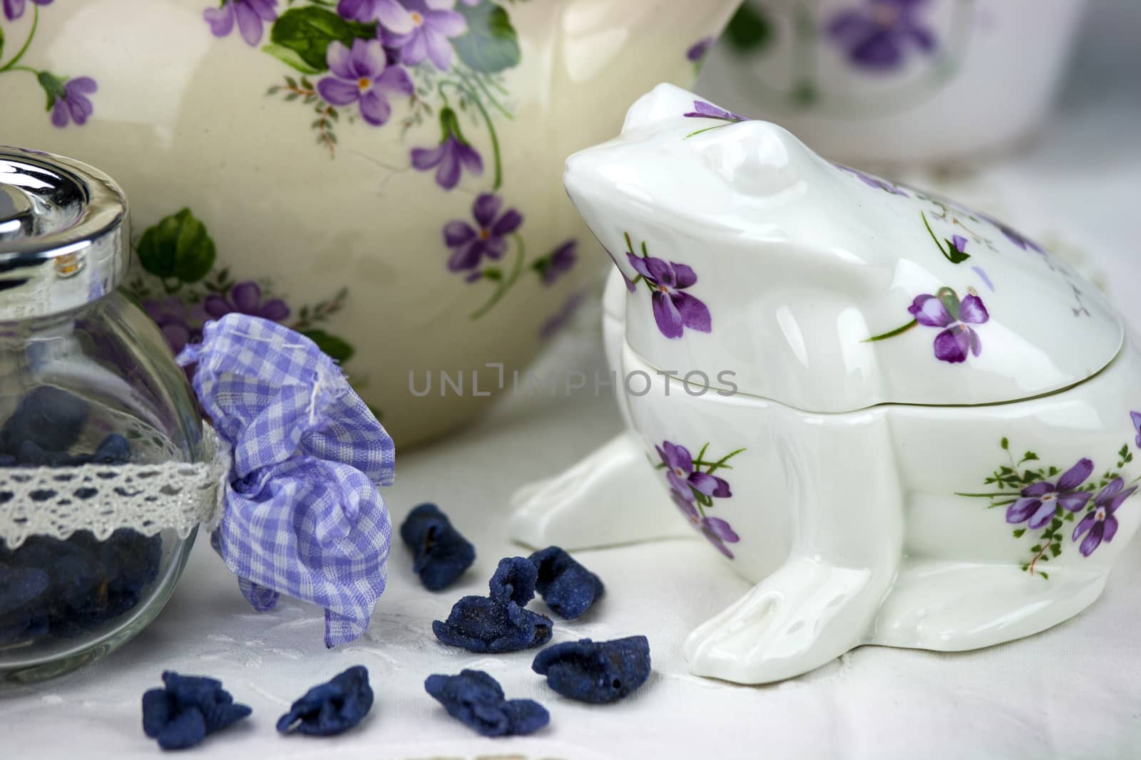 English afternoon tea with sweet and candied violets
