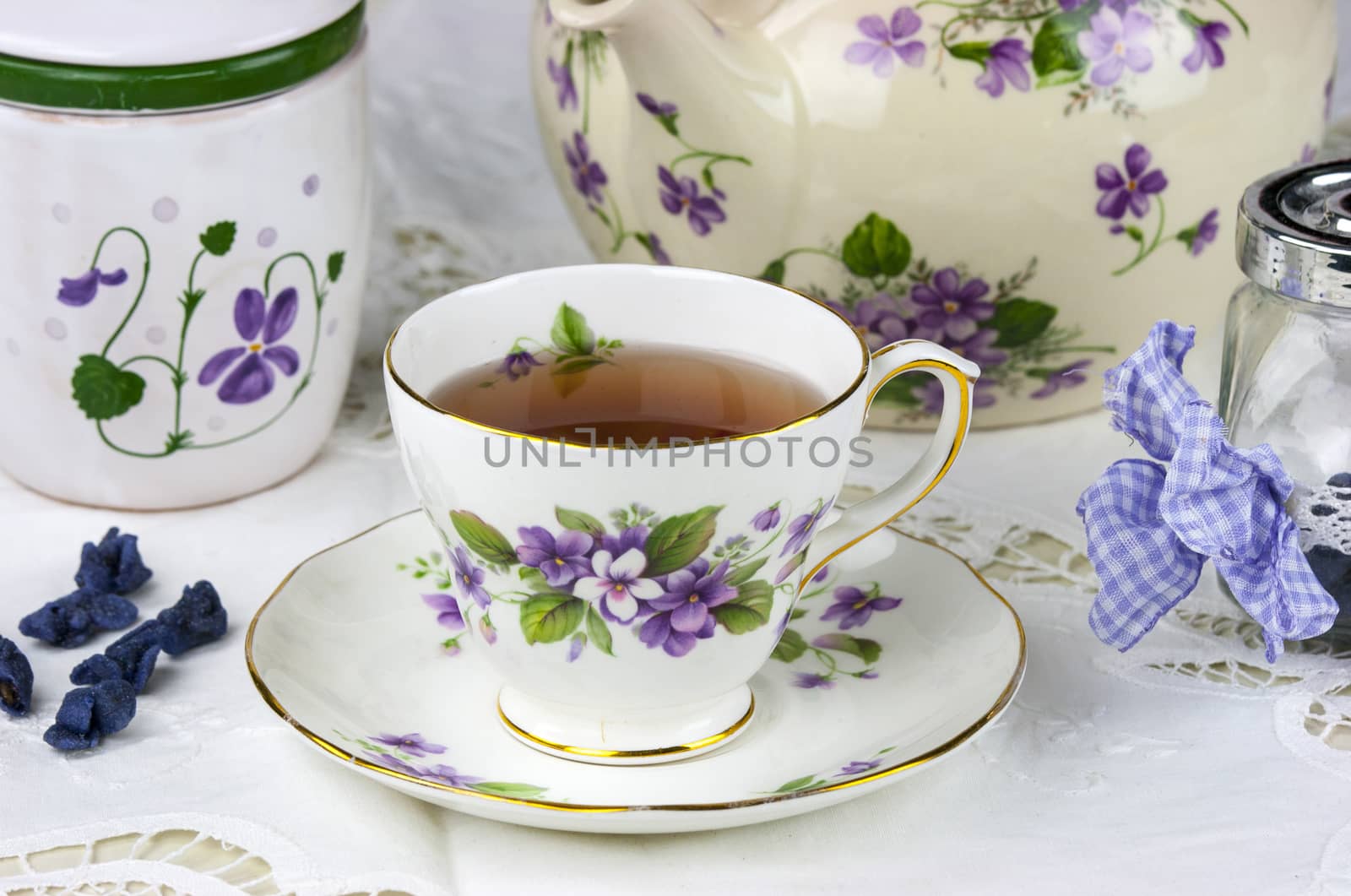 English afternoon tea with sweet and candied violets