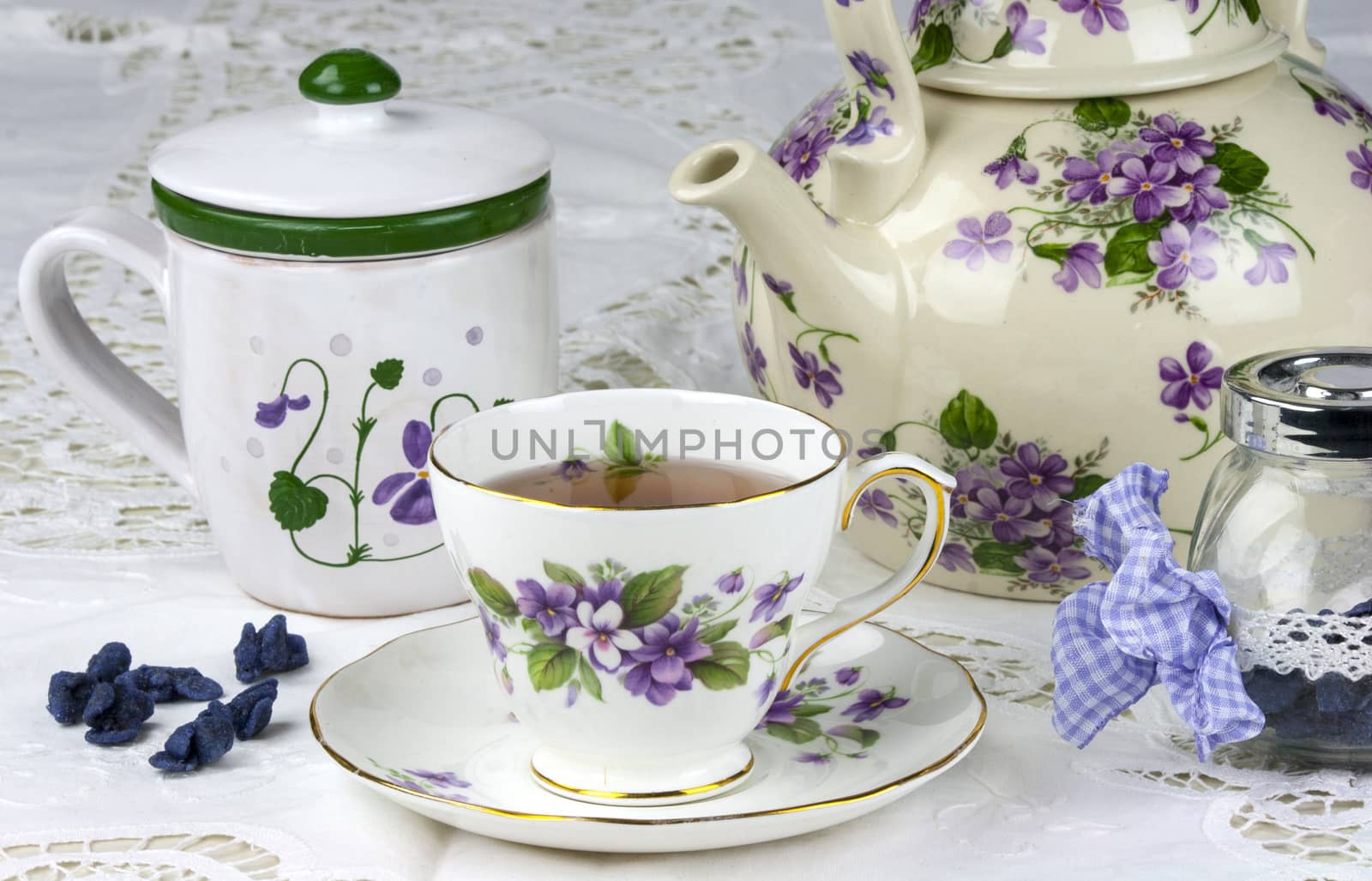 English afternoon tea with sweet and candied violets